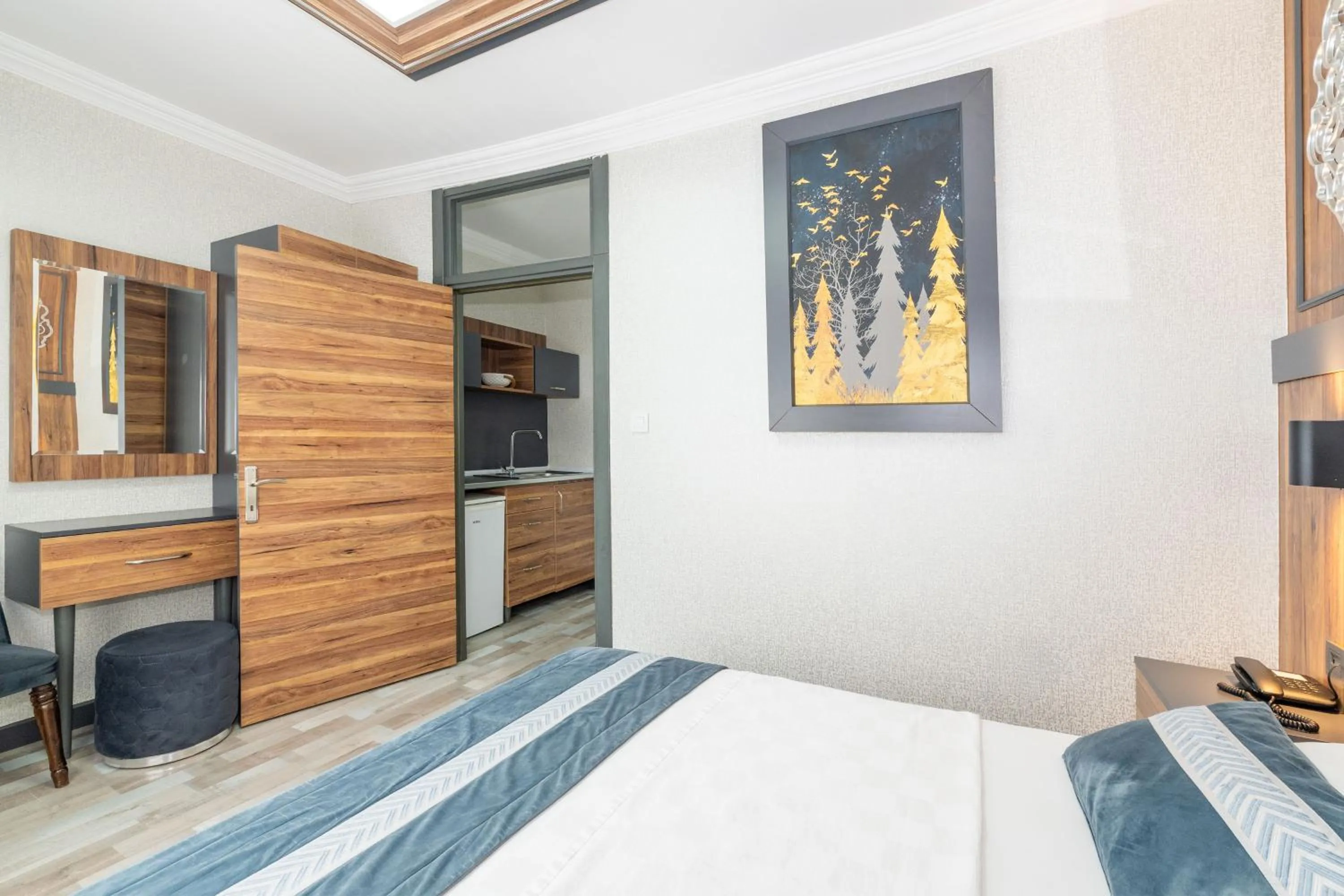 Bed in La Serena Taxim Hotel