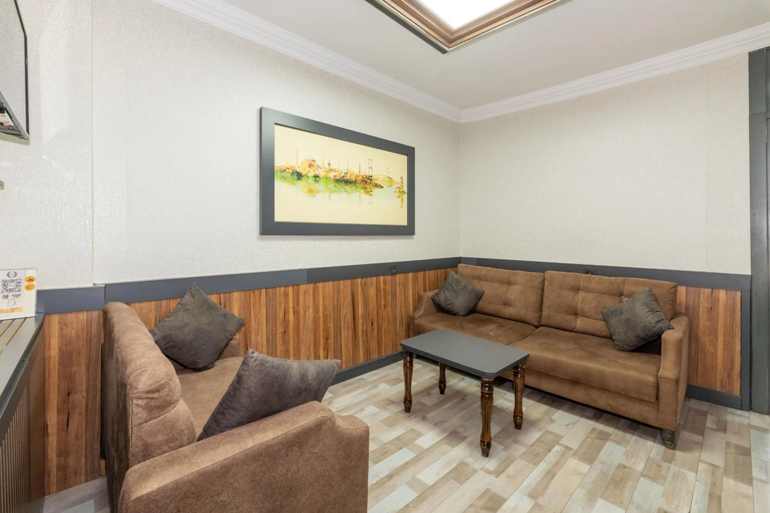 Living room in La Serena Taxim Hotel