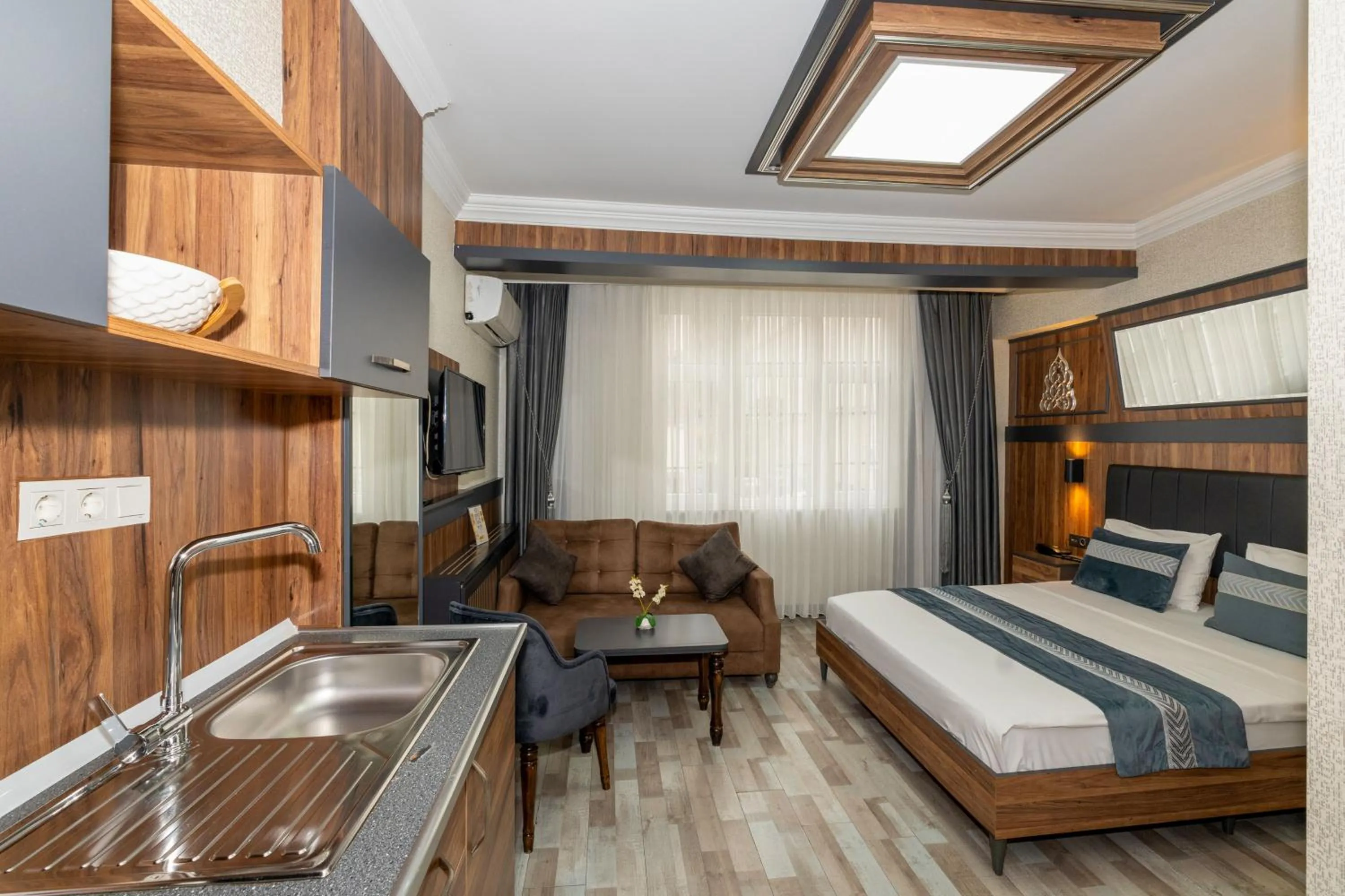 Bed in La Serena Taxim Hotel