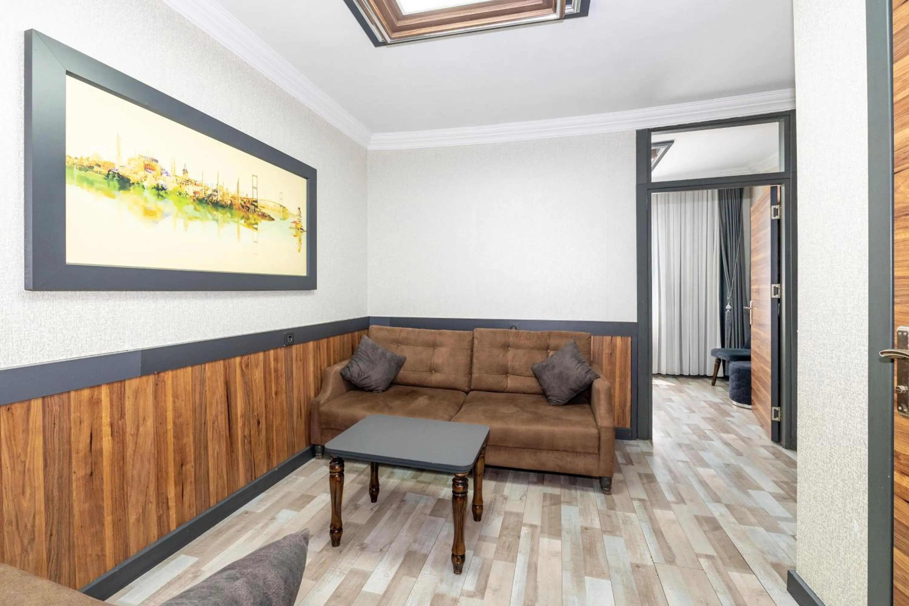 Living room in La Serena Taxim Hotel