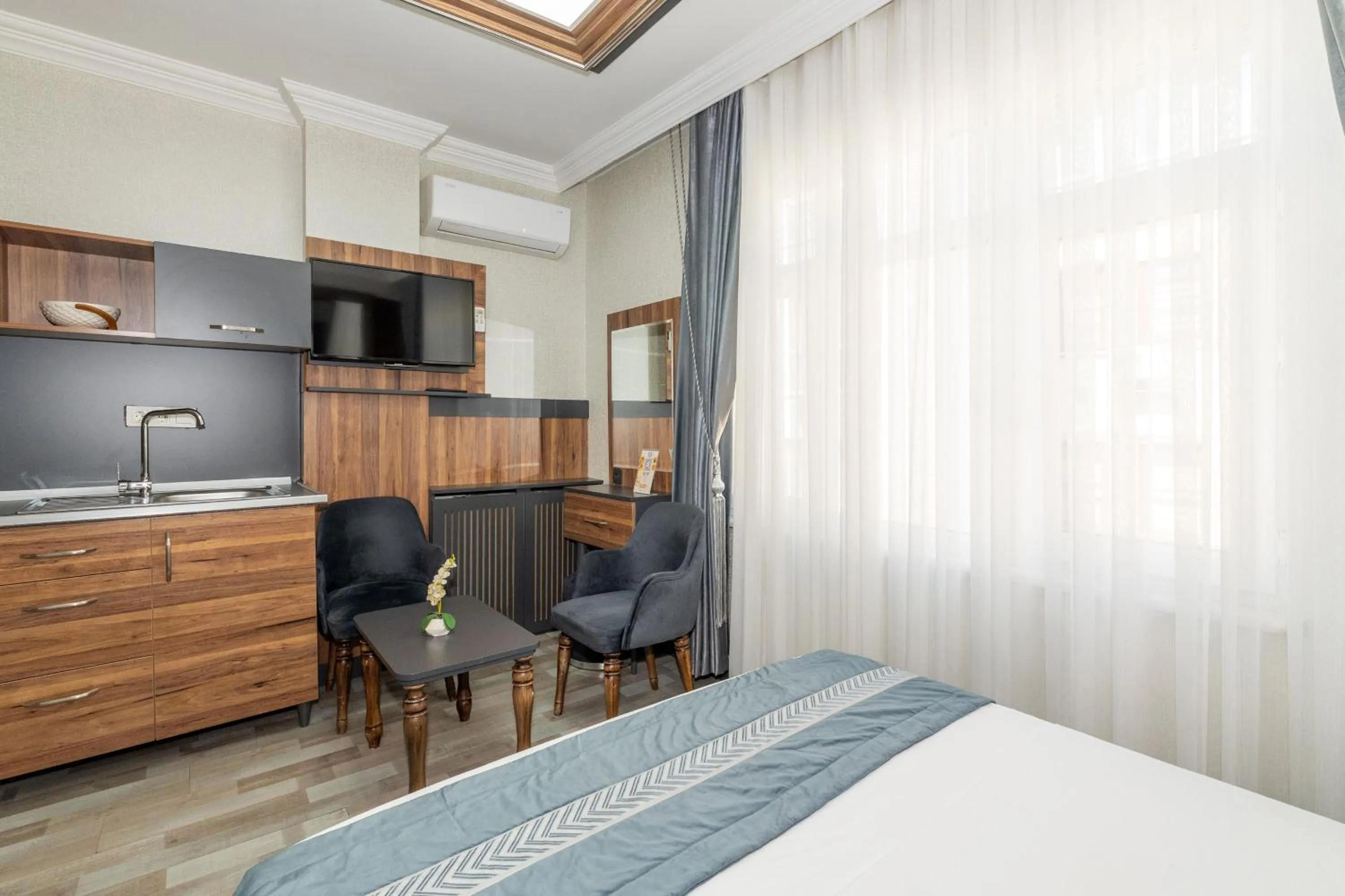 Bed in La Serena Taxim Hotel