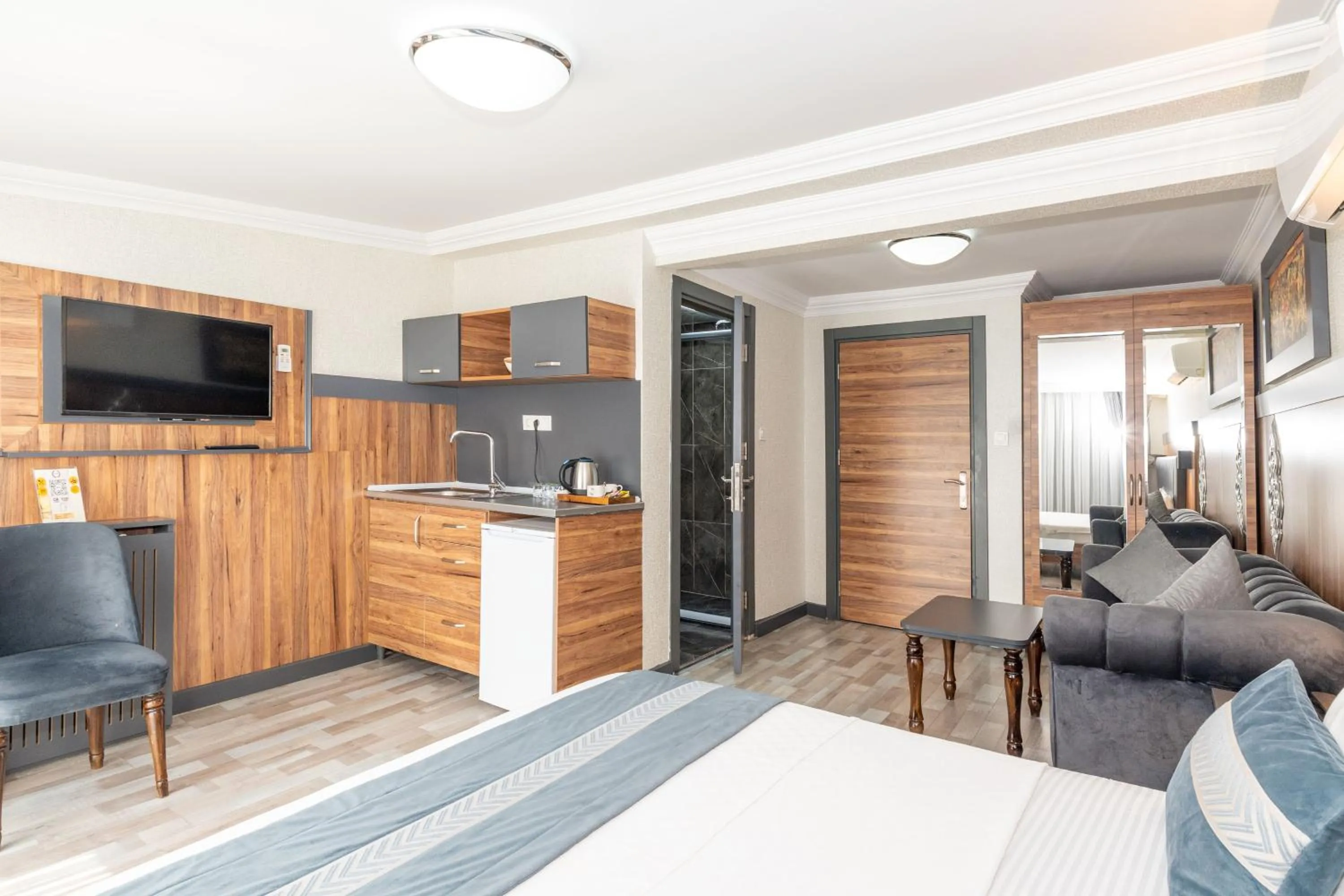 Bed in La Serena Taxim Hotel