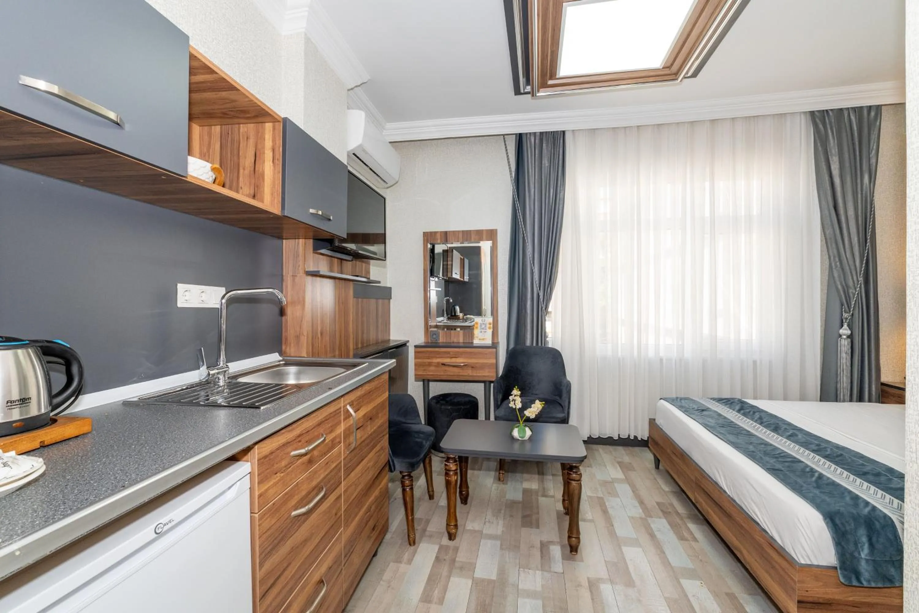 Bed in La Serena Taxim Hotel