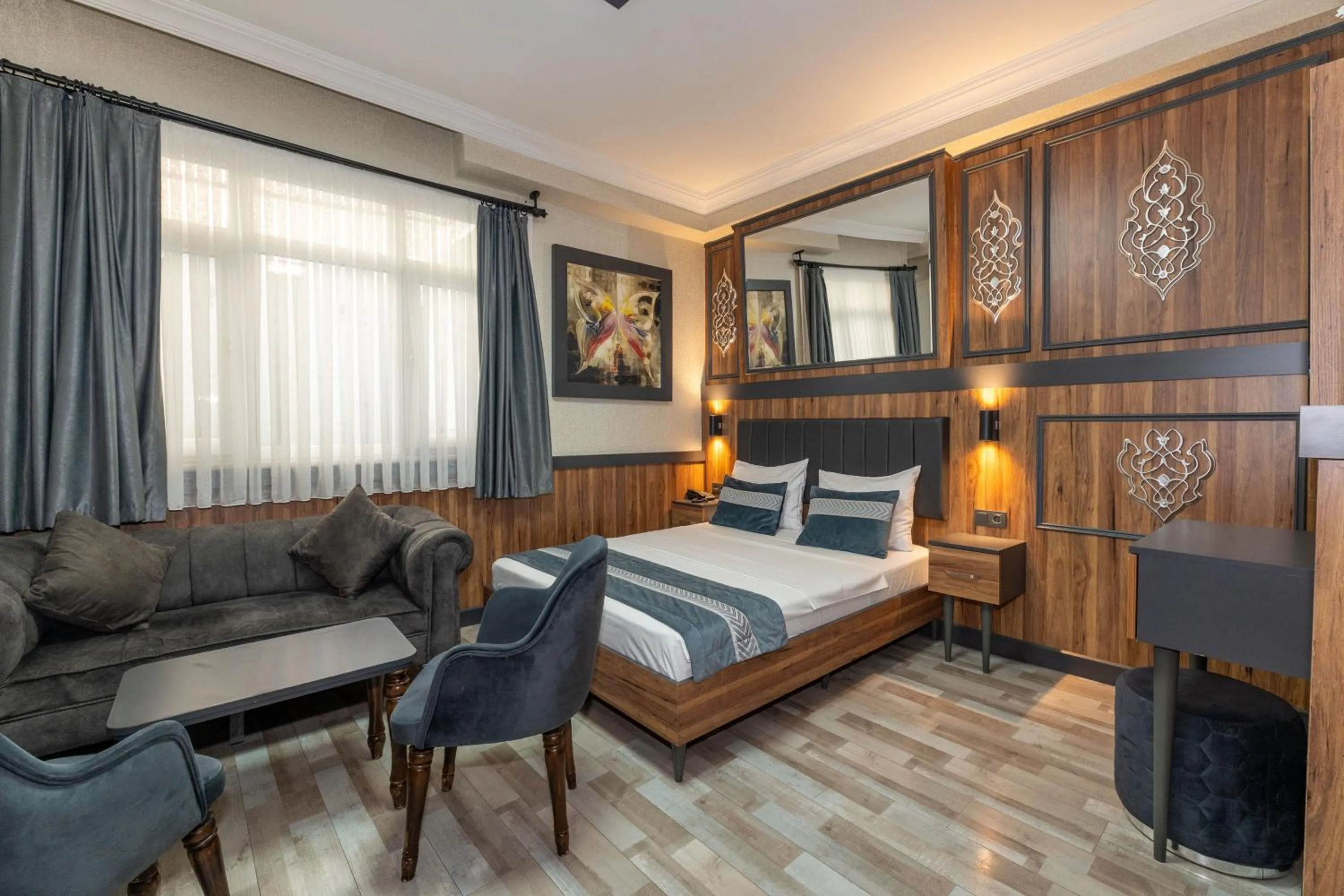 Bed in La Serena Taxim Hotel