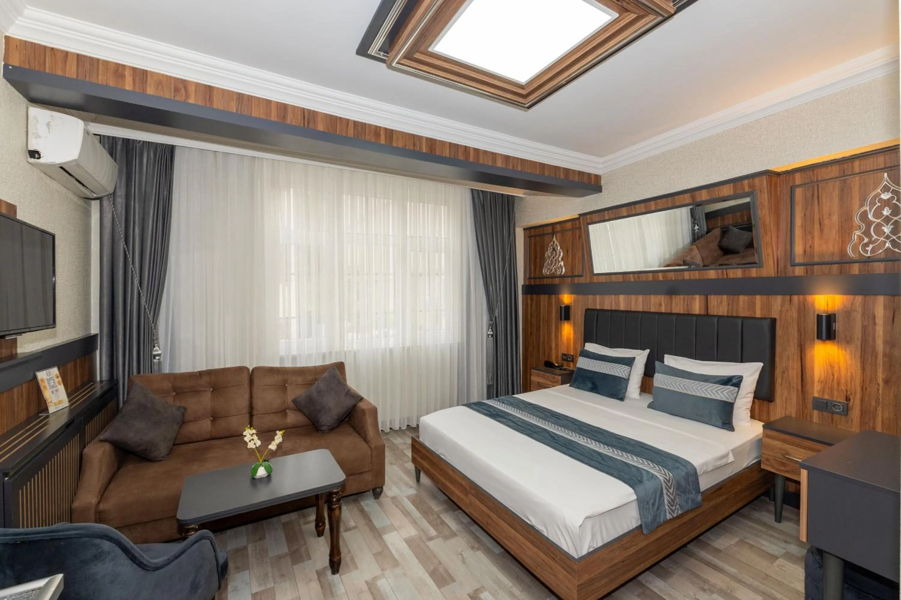 Bed in La Serena Taxim Hotel