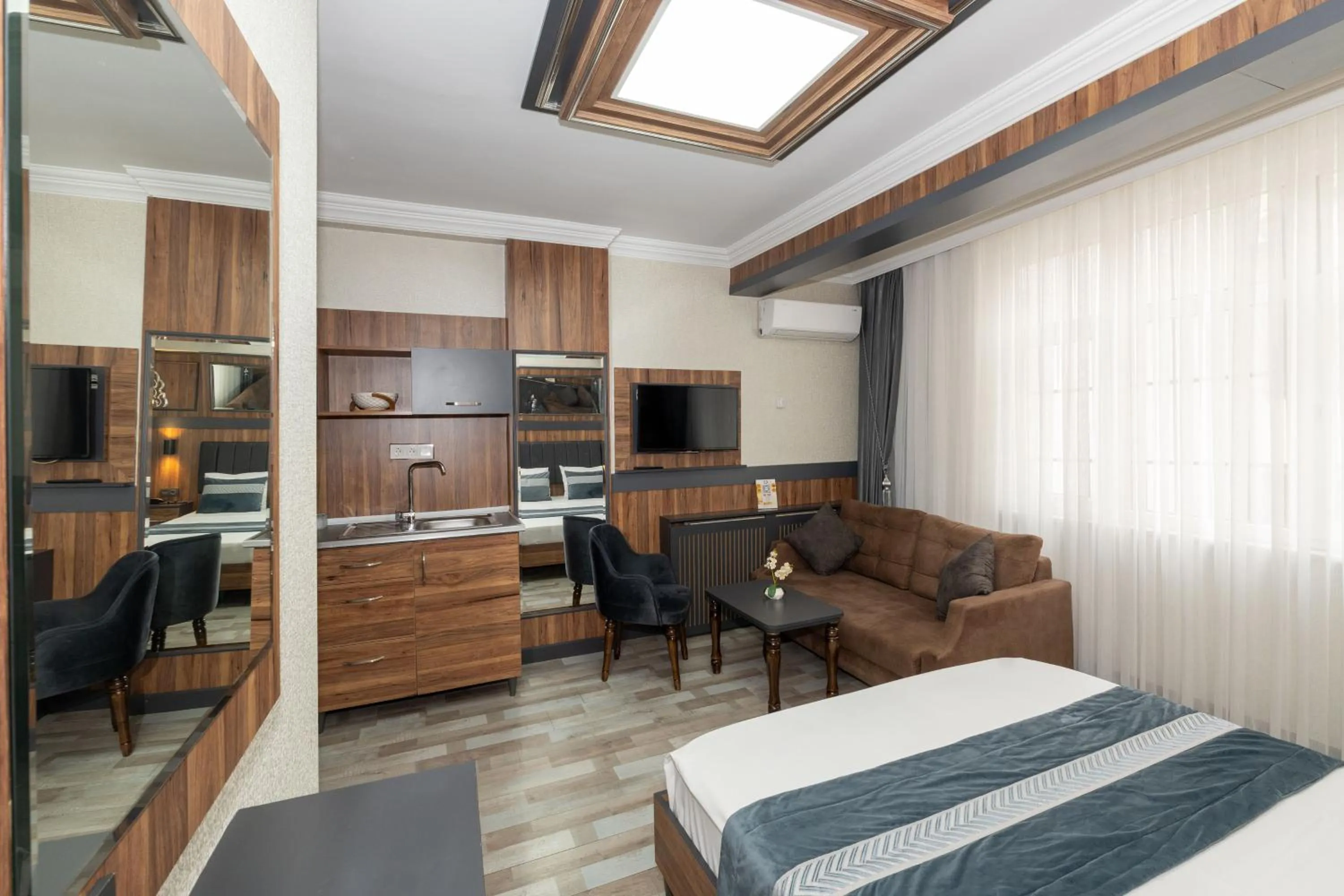 Bed in La Serena Taxim Hotel