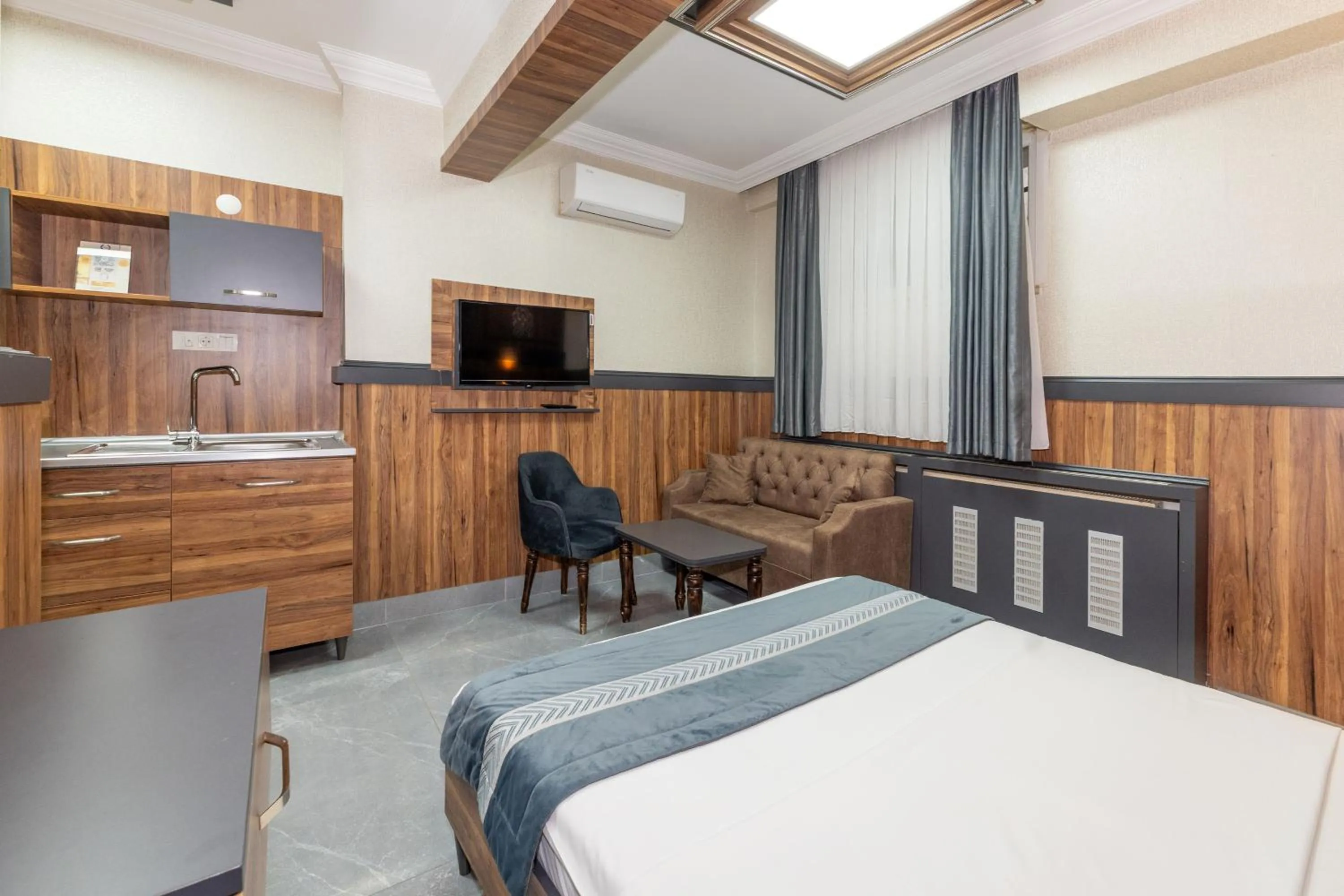 Bed in La Serena Taxim Hotel