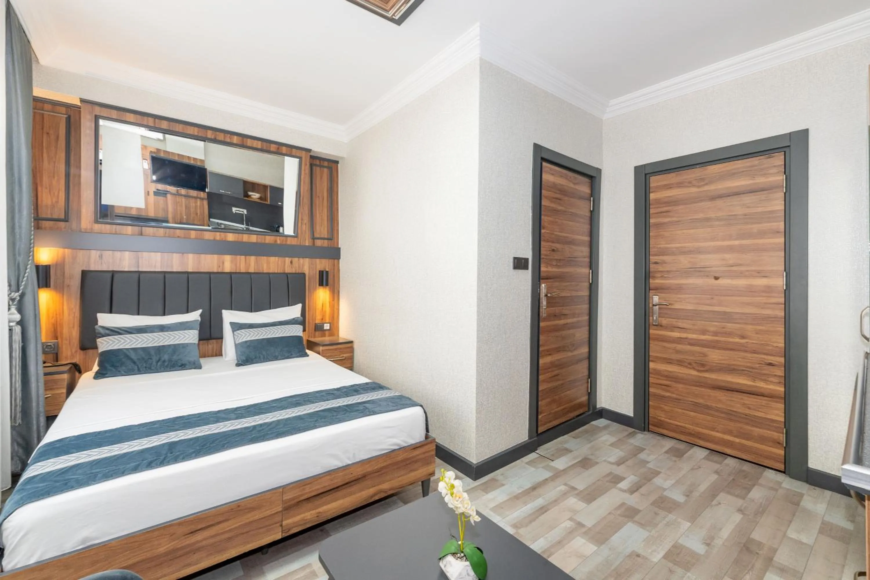 Bed in La Serena Taxim Hotel