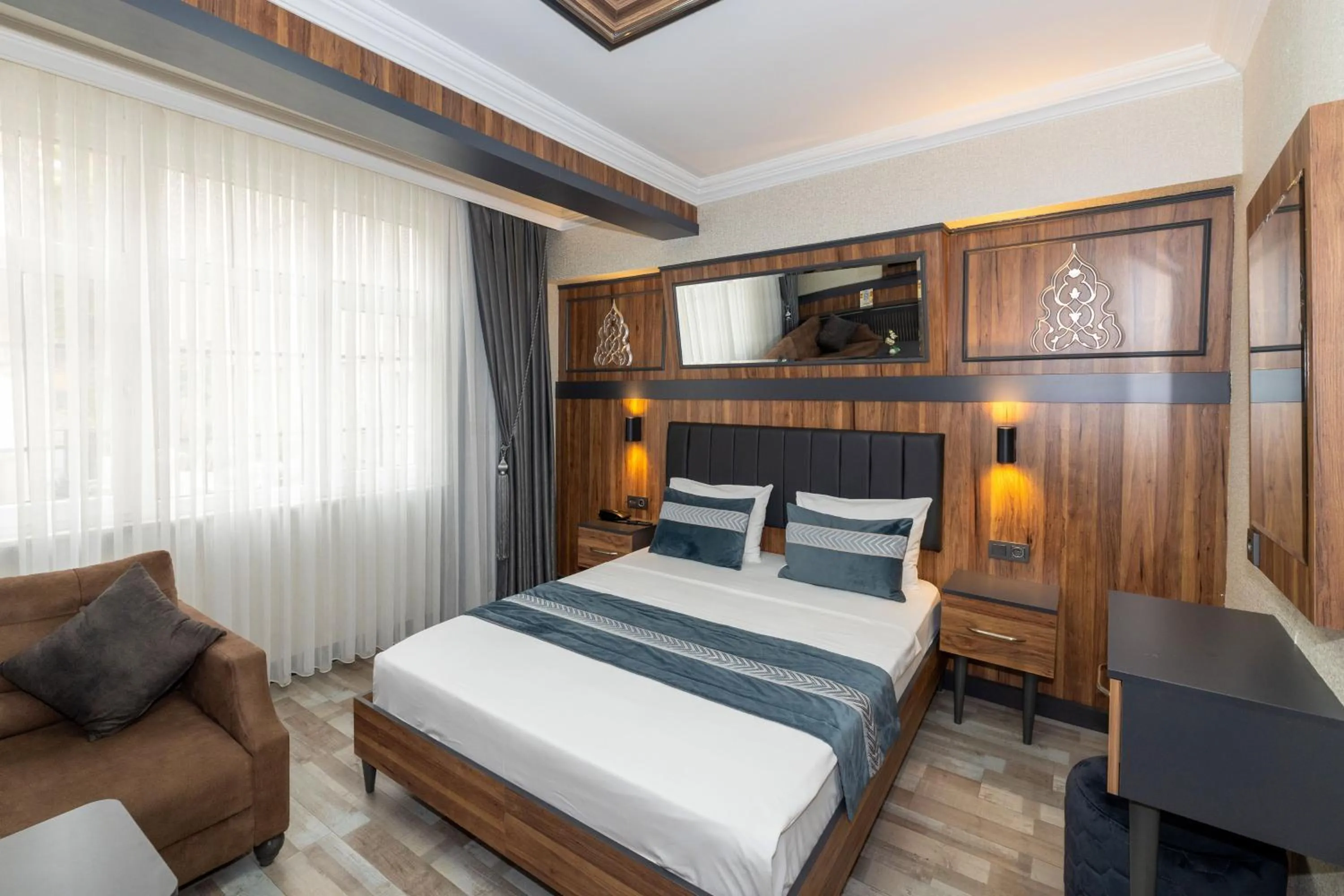 Bed in La Serena Taxim Hotel