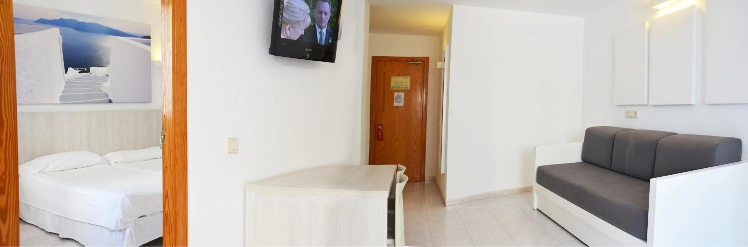 Living room, Bed in Apartamentos Vibra Panoramic