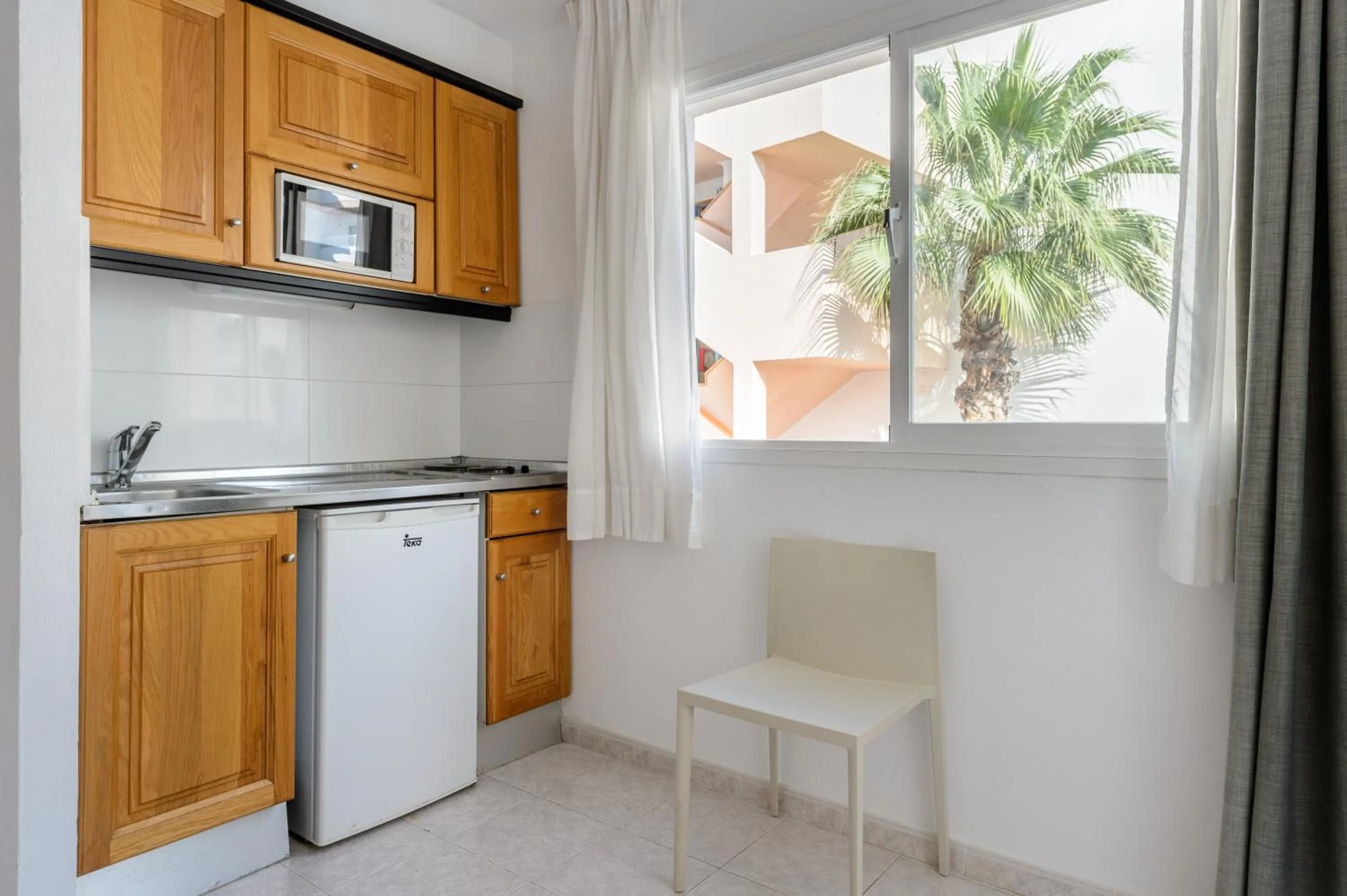 Kitchen or kitchenette in Apartamentos Vibra Panoramic