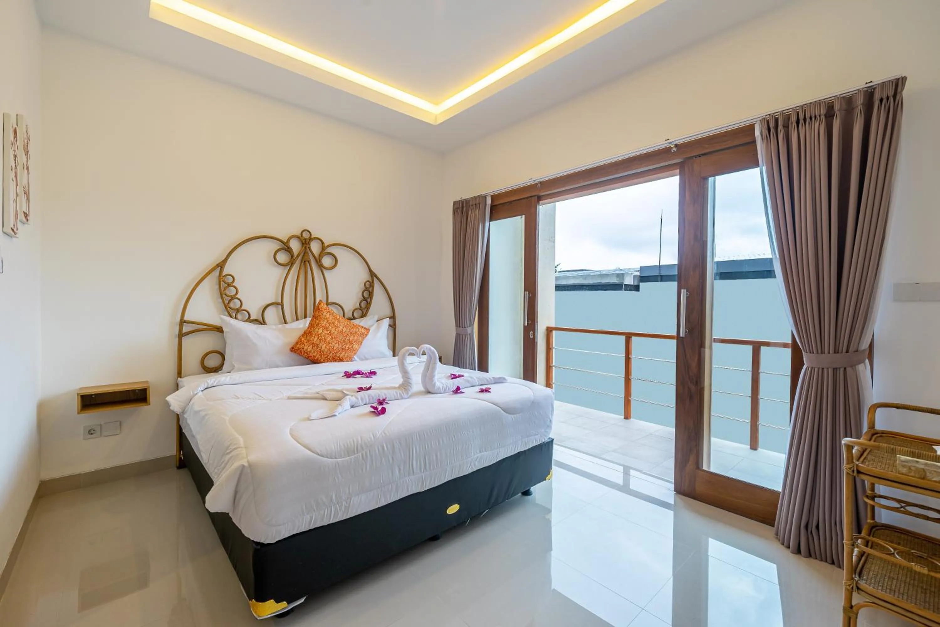 Bed in Kasmaran Bali Guest House