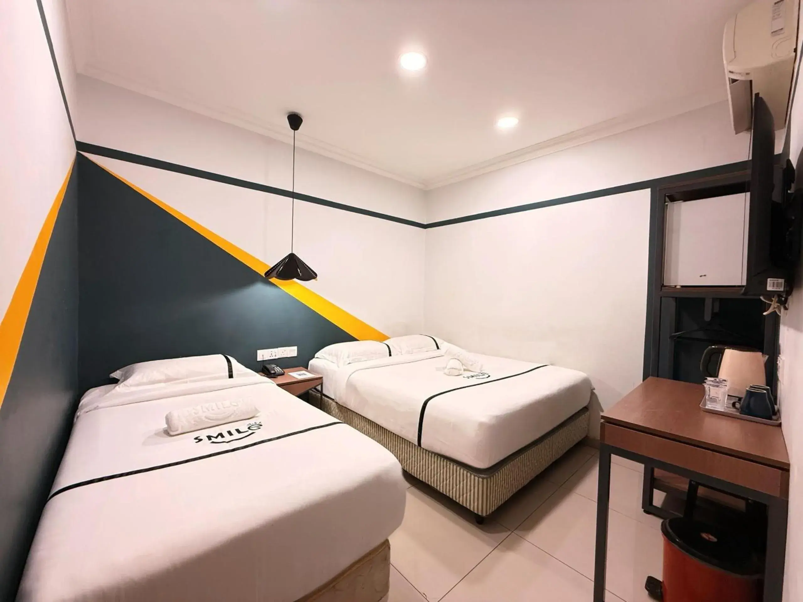 Triple Room in Smile Hotel Serdang South City Triple Room in Smile Hotel Serdang South City