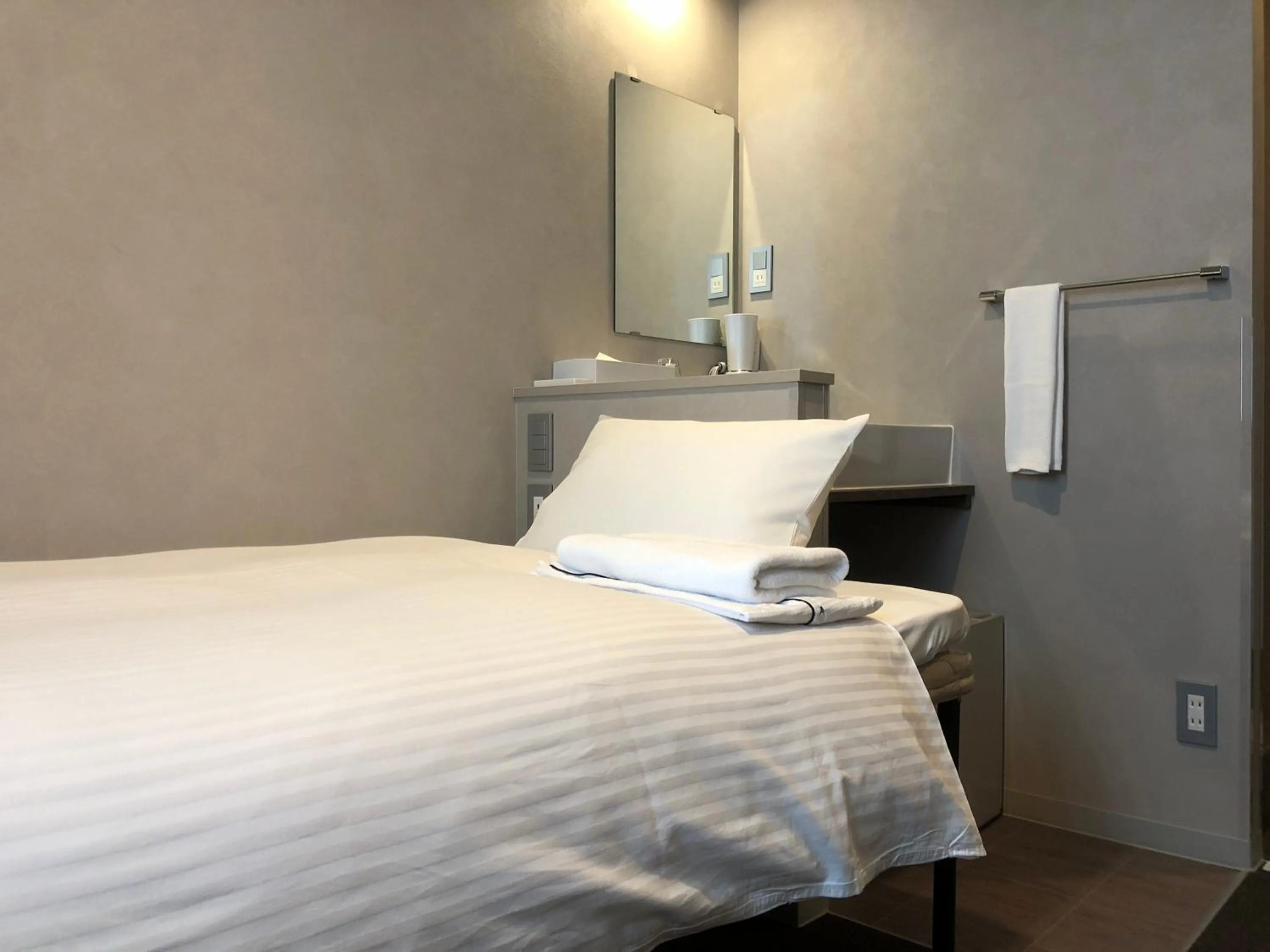 Bed in Hotel Gee Haive