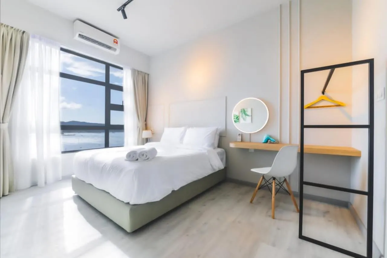 Photo of the whole room, Bed in TF Sunset Ocean View Homestay - Jesselton Quay