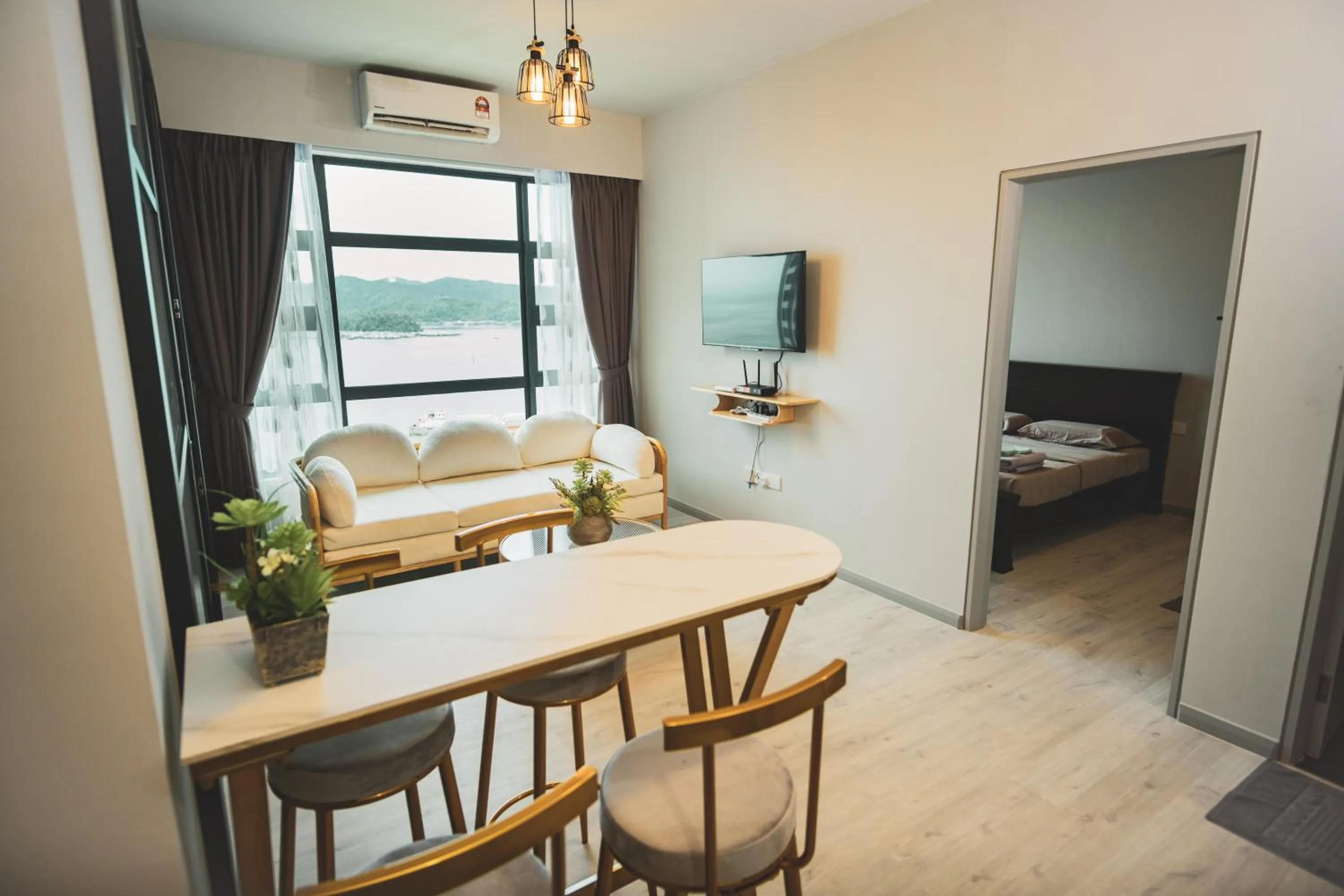 Living room, Bed in TF Sunset Ocean View Homestay - Jesselton Quay