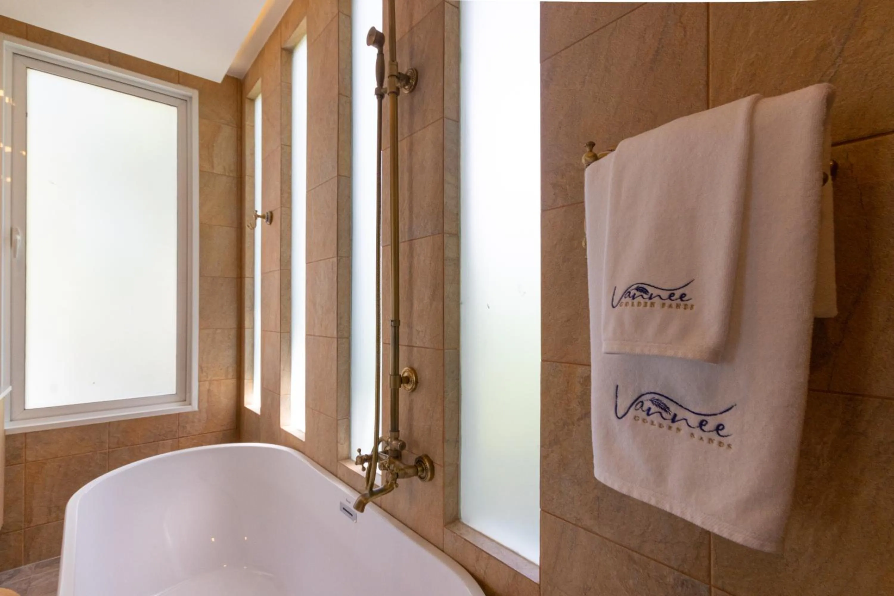 Bathroom in Vannee Golden Sands Beachfront Resort