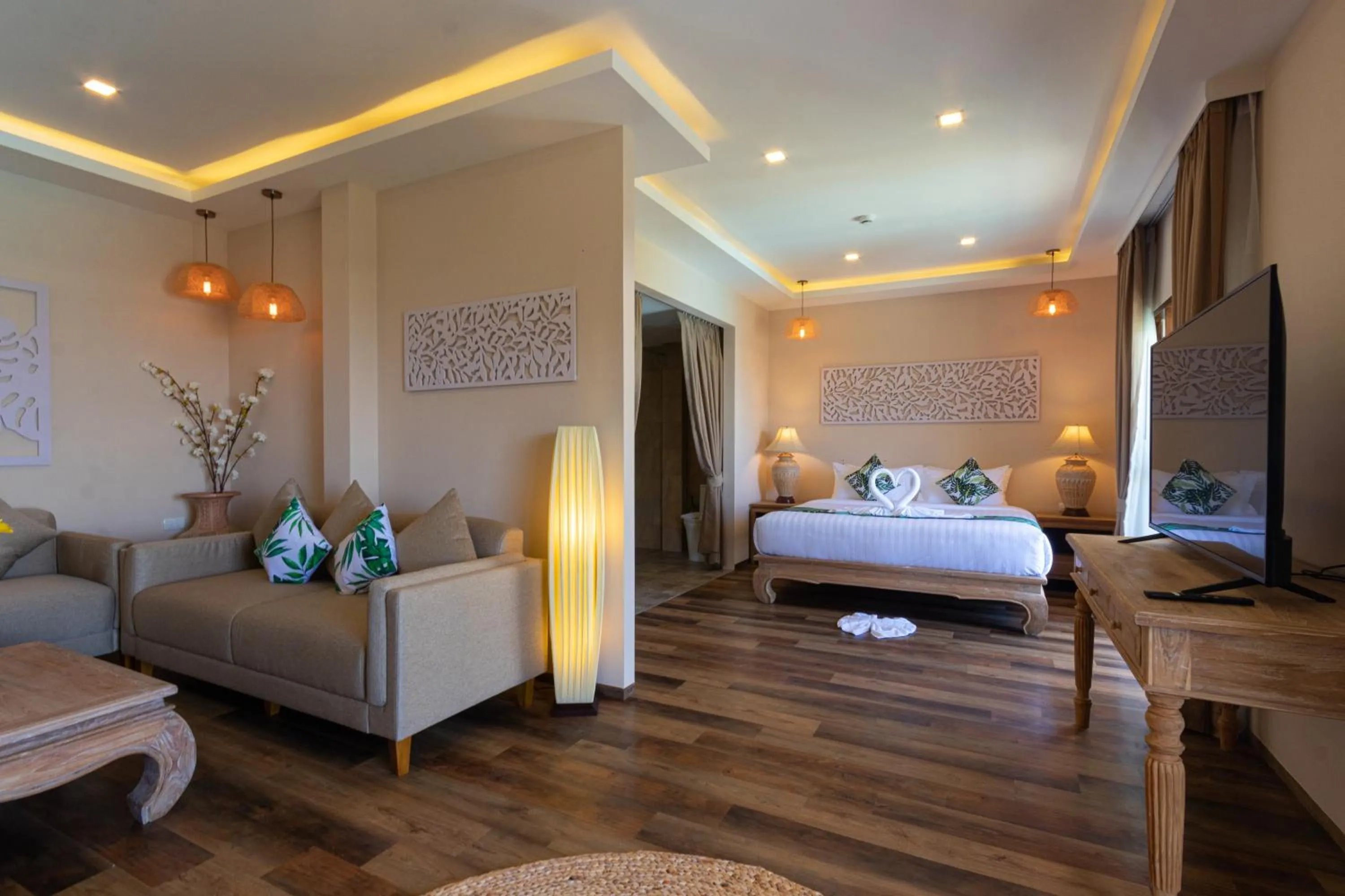 Living room, Bed in Vannee Golden Sands Beachfront Resort