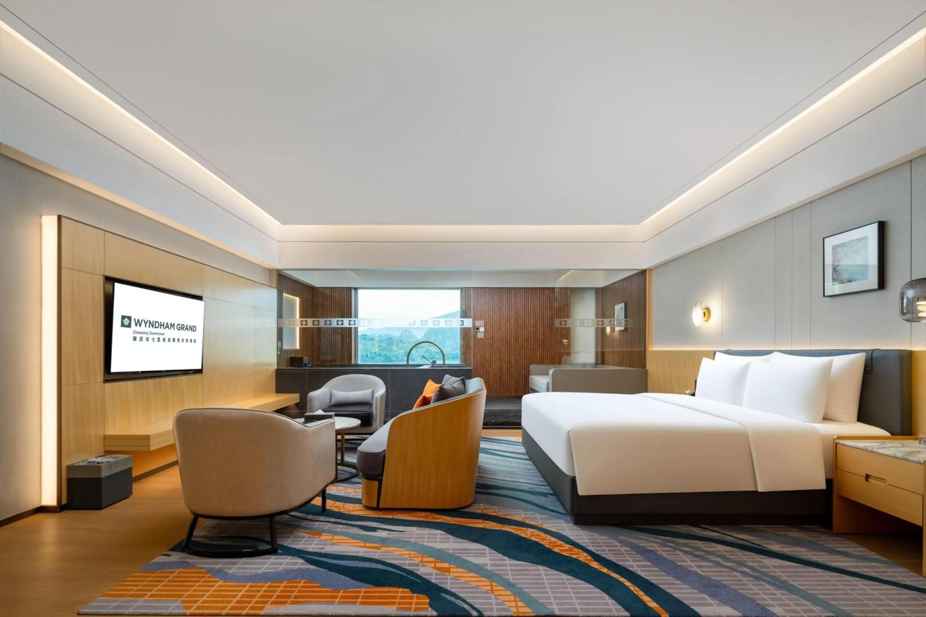 Photo of the whole room, Bed in Wyndham Grand Zhaoqing Downtown