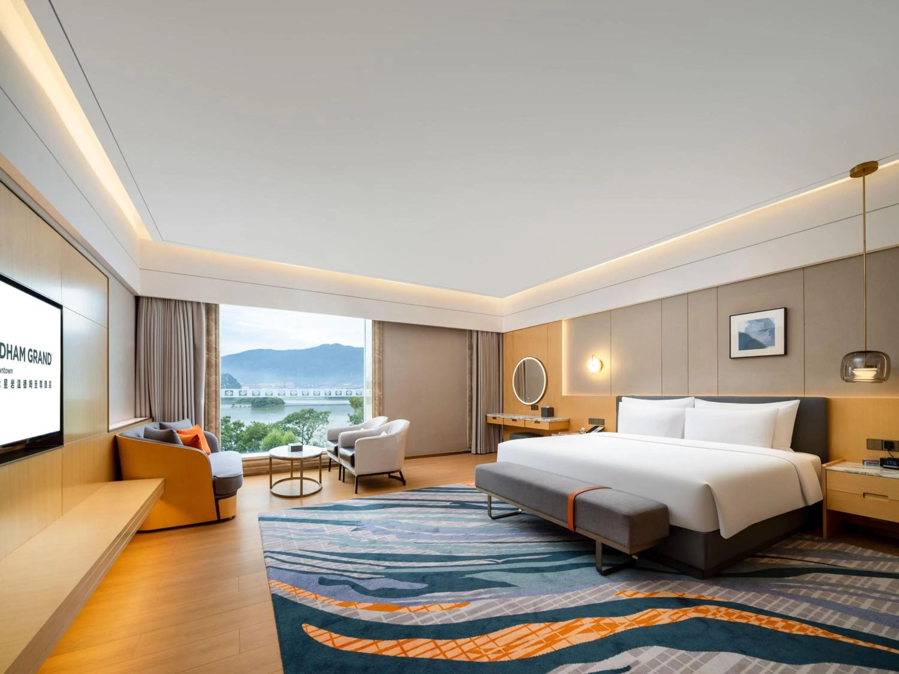 Photo of the whole room, Bed in Wyndham Grand Zhaoqing Downtown