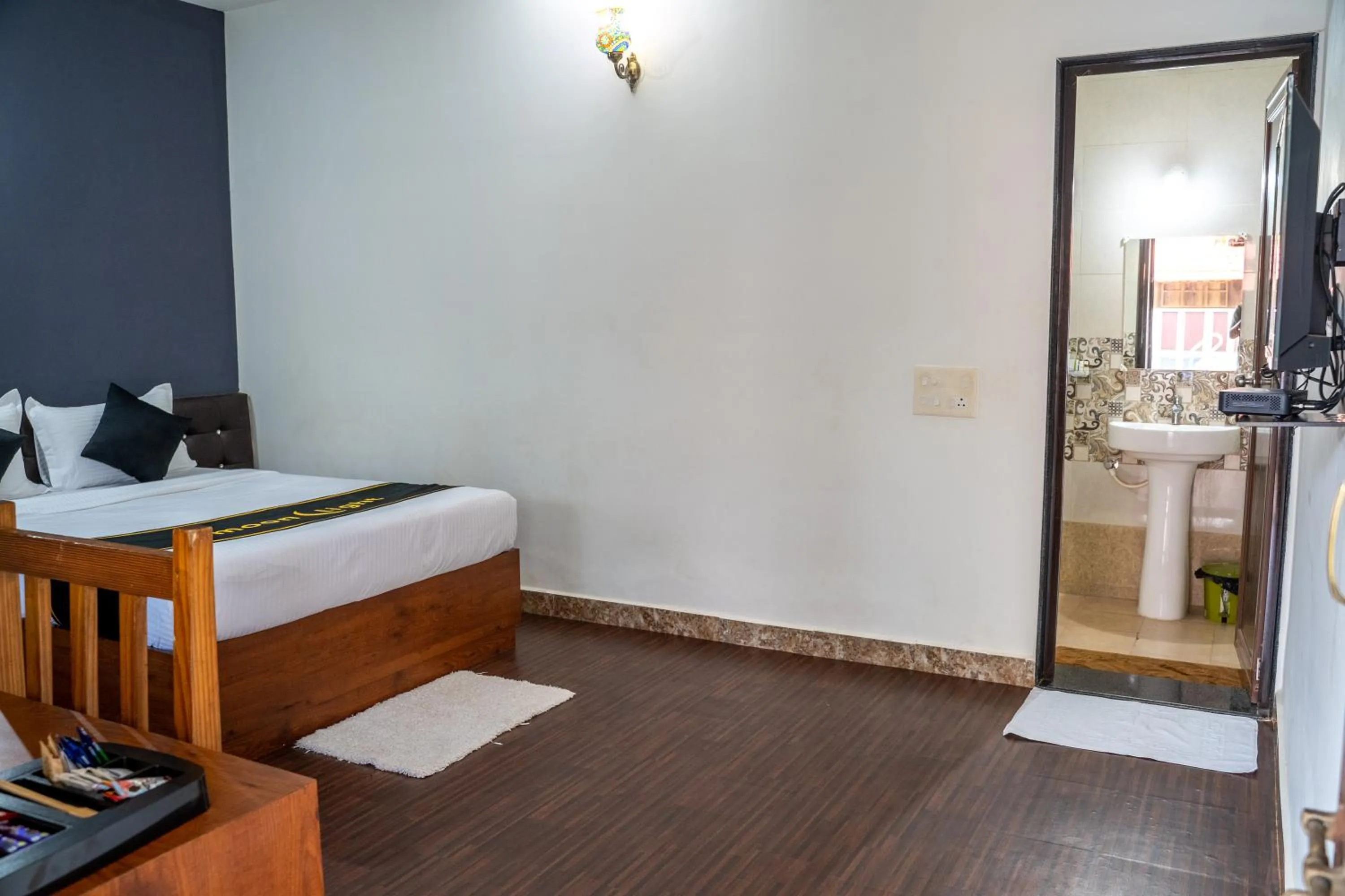 Photo of the whole room, Bed in DhanRains Moonlight Retreat Cottages