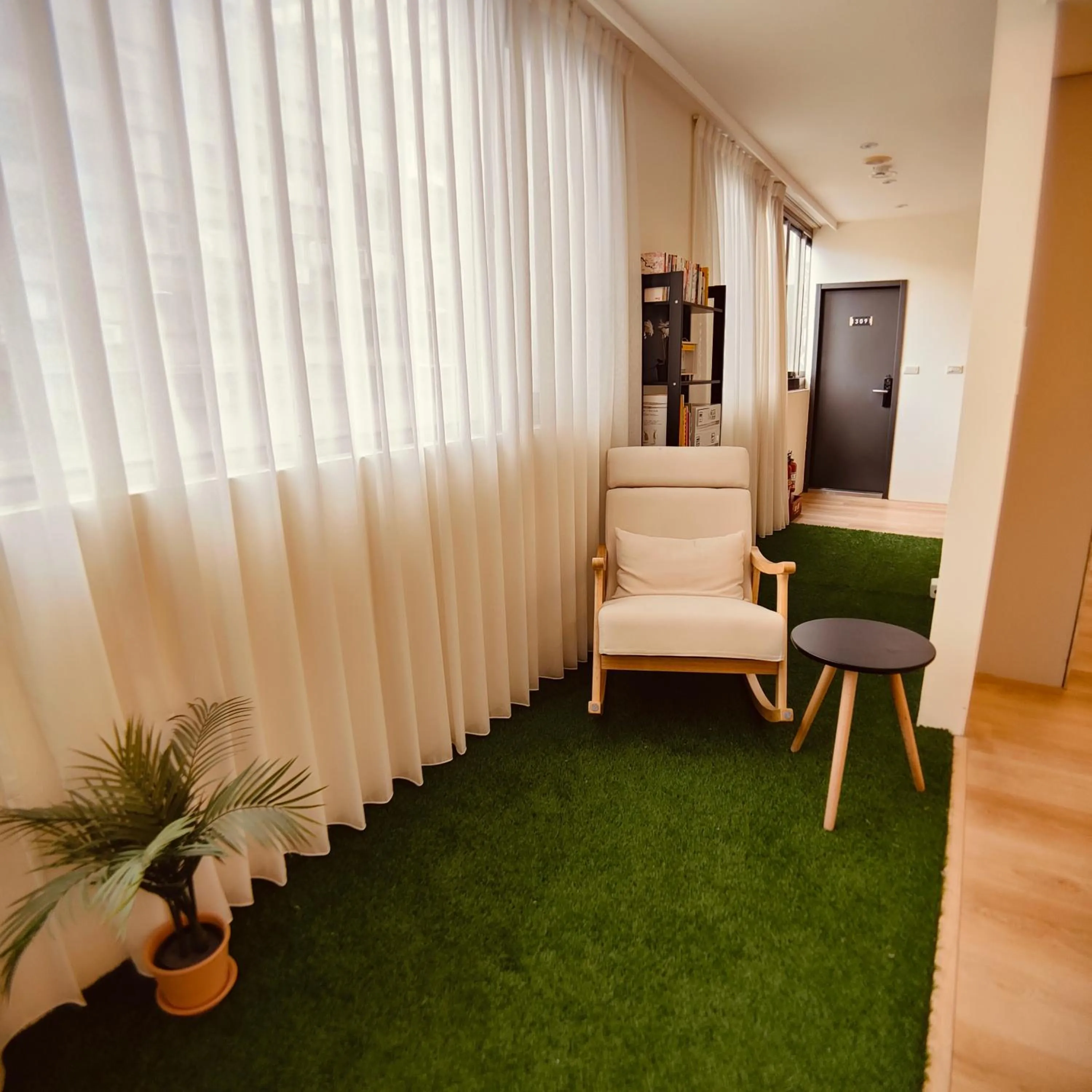 Communal lounge/ TV room in Fooyee Hotel - Yonghe