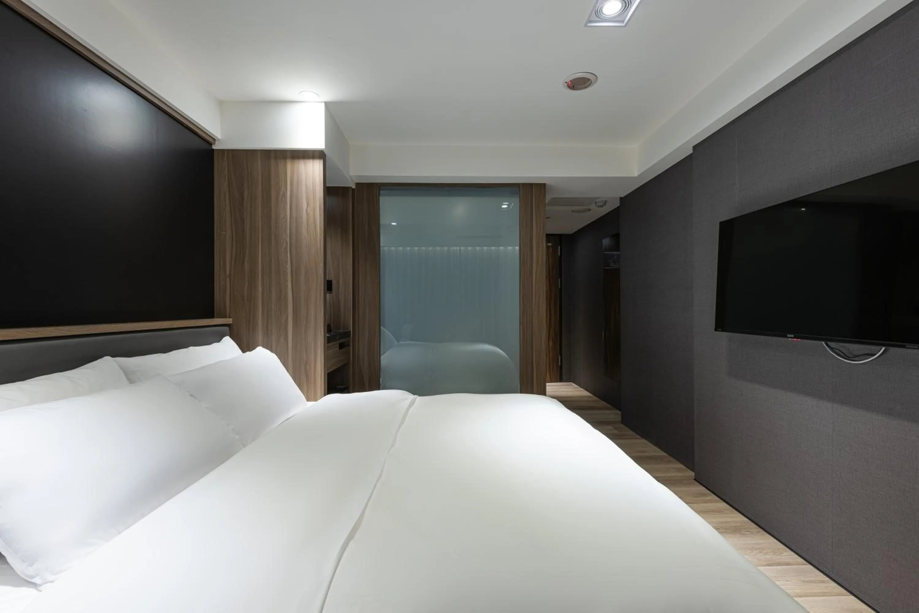 Bed in Autumn Willow Hotel