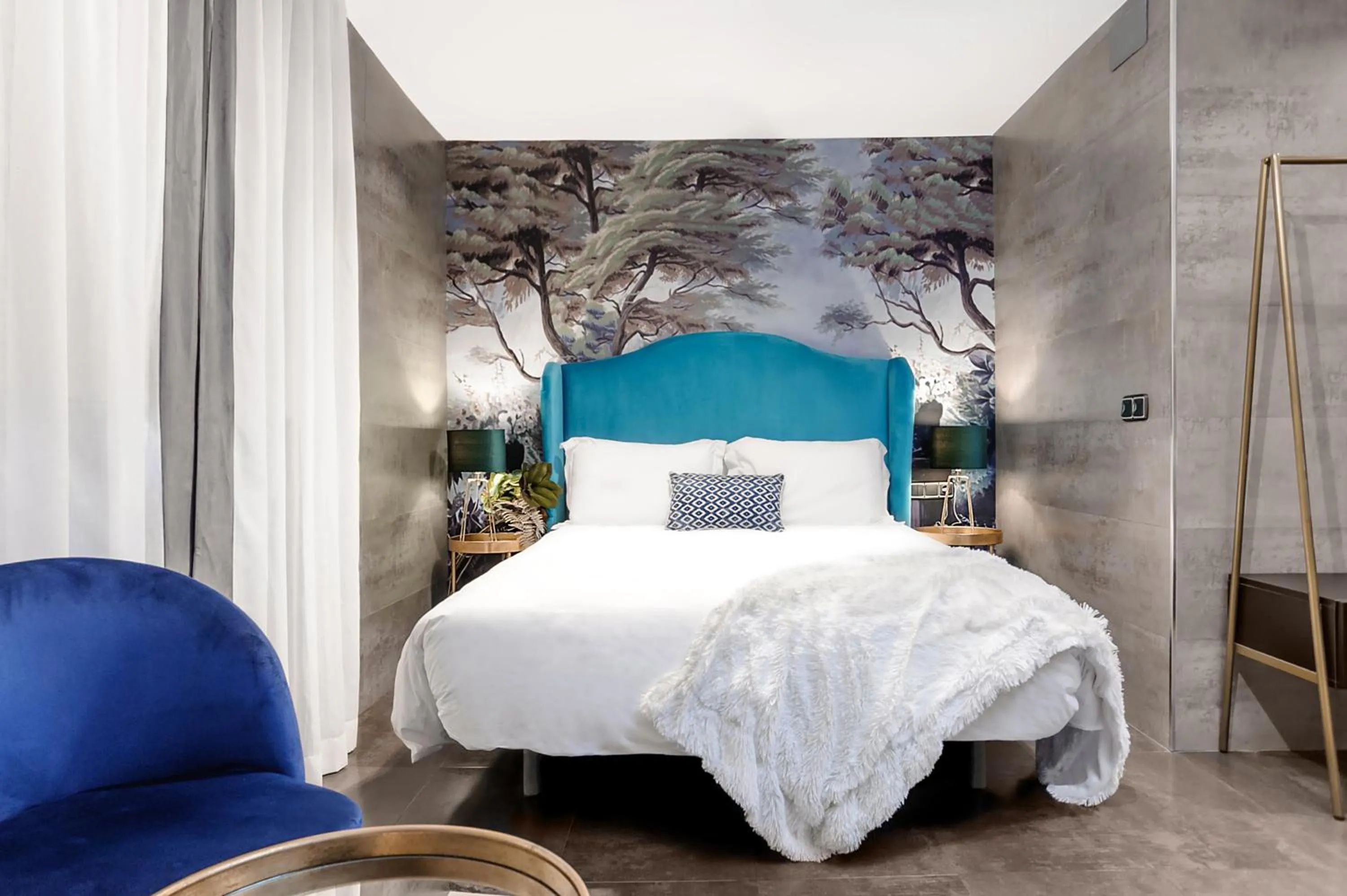 Bed in Hotel Los Girasoles by Maxi Hoteles