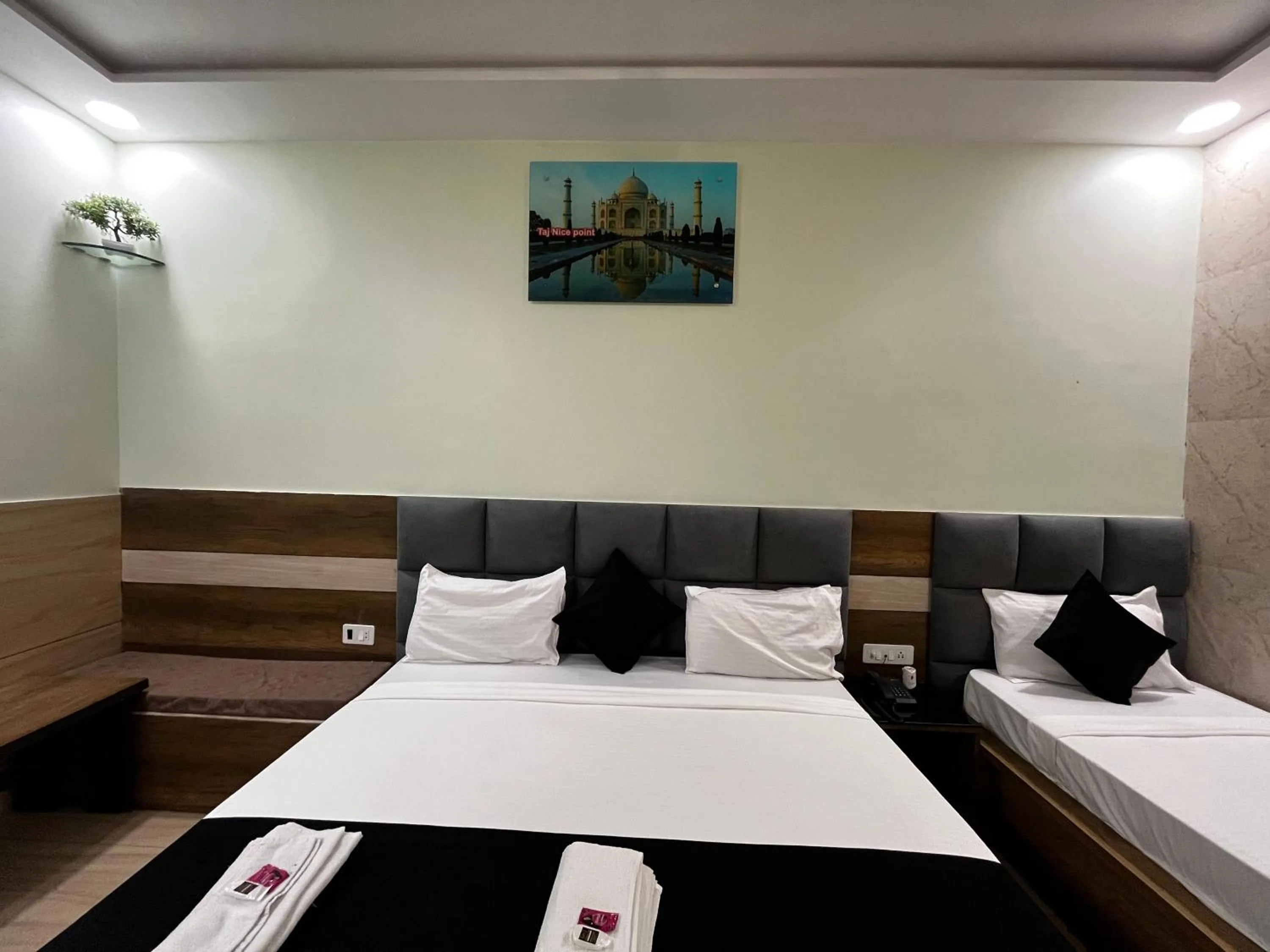 Bed in Taj Nice Point Manage by Taj Sunrise Group