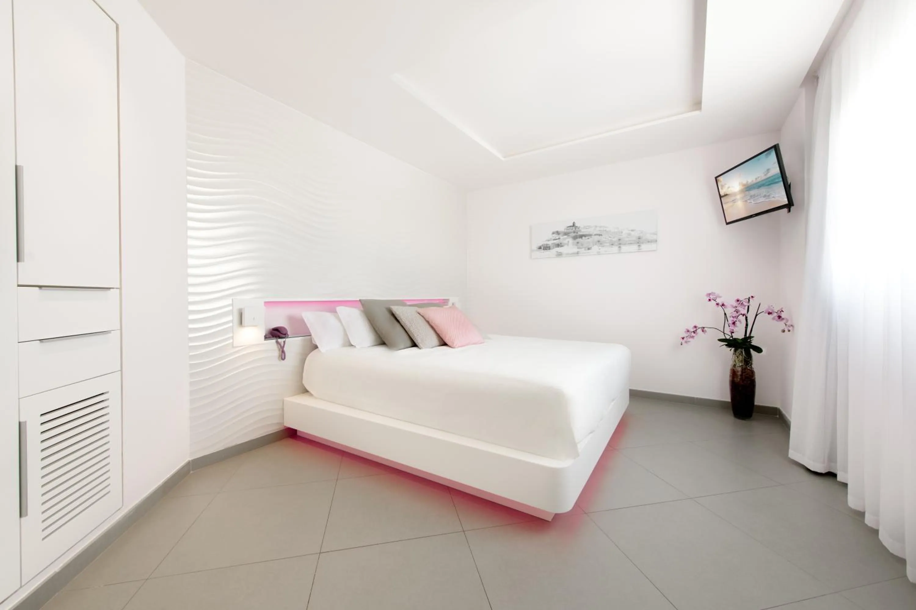 Bedroom, Bed in Hotel Garbi Ibiza & Spa