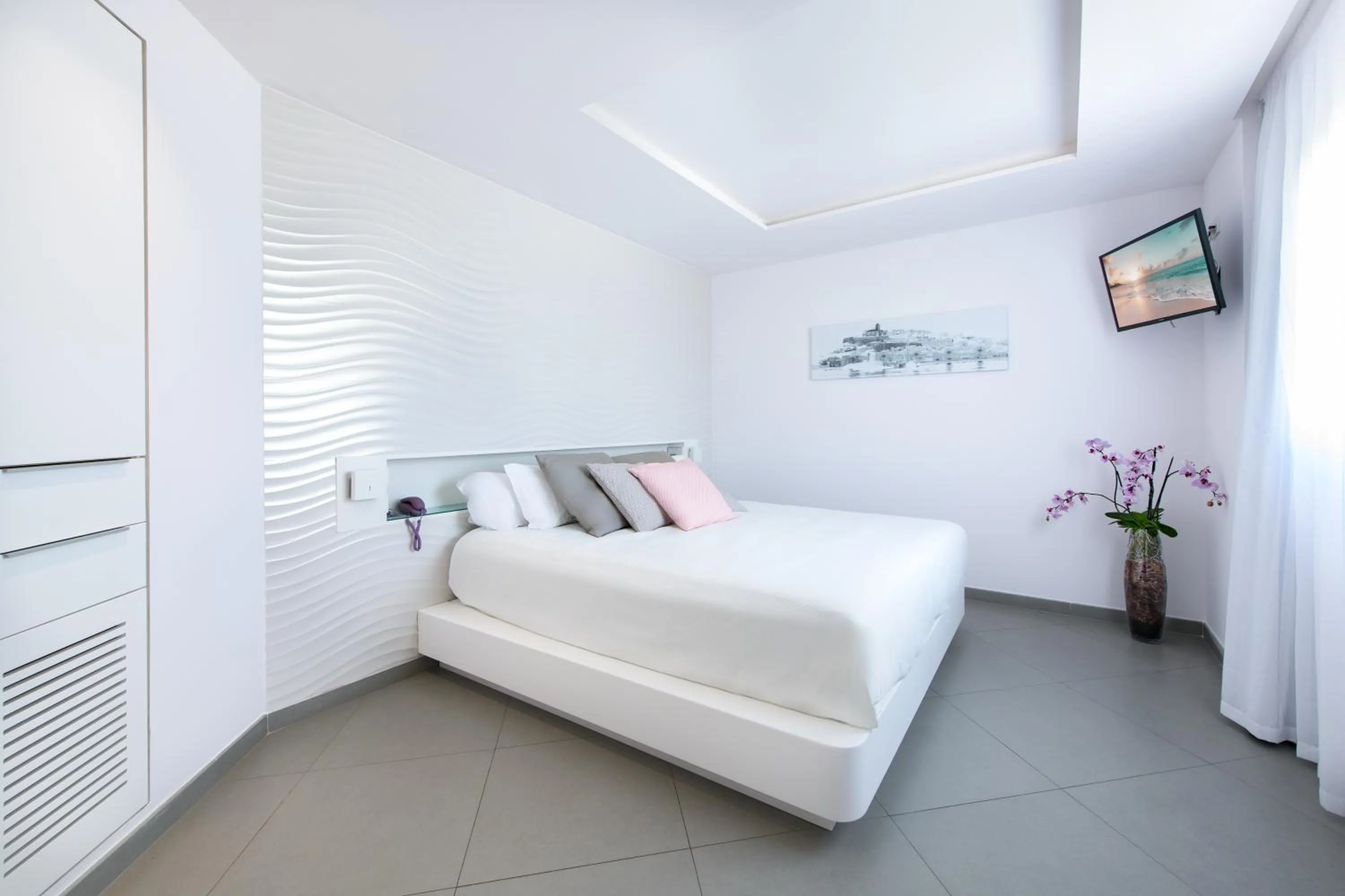 Bedroom, Bed in Hotel Garbi Ibiza & Spa