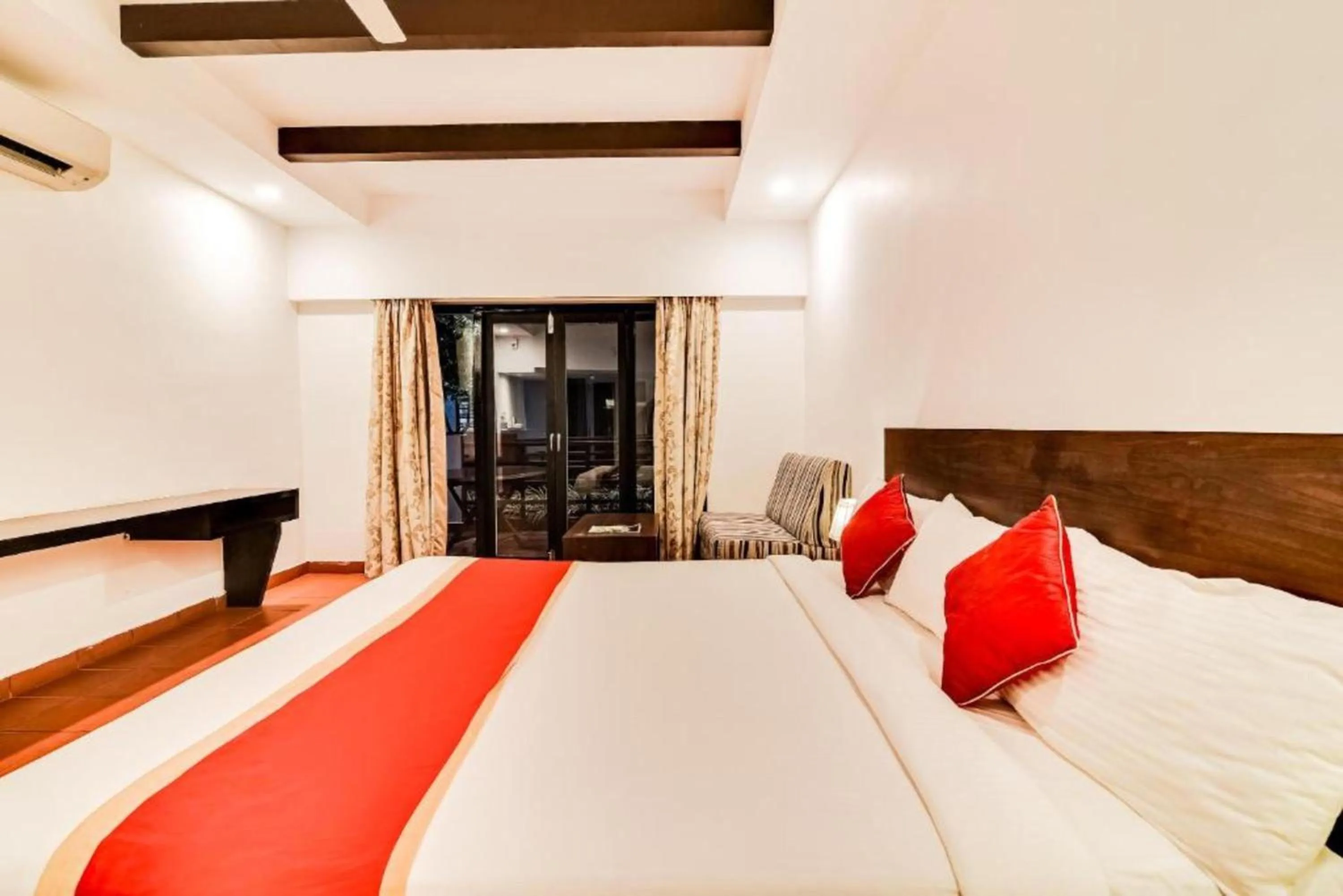 Bed in Reva Resorts and Holiday Homes