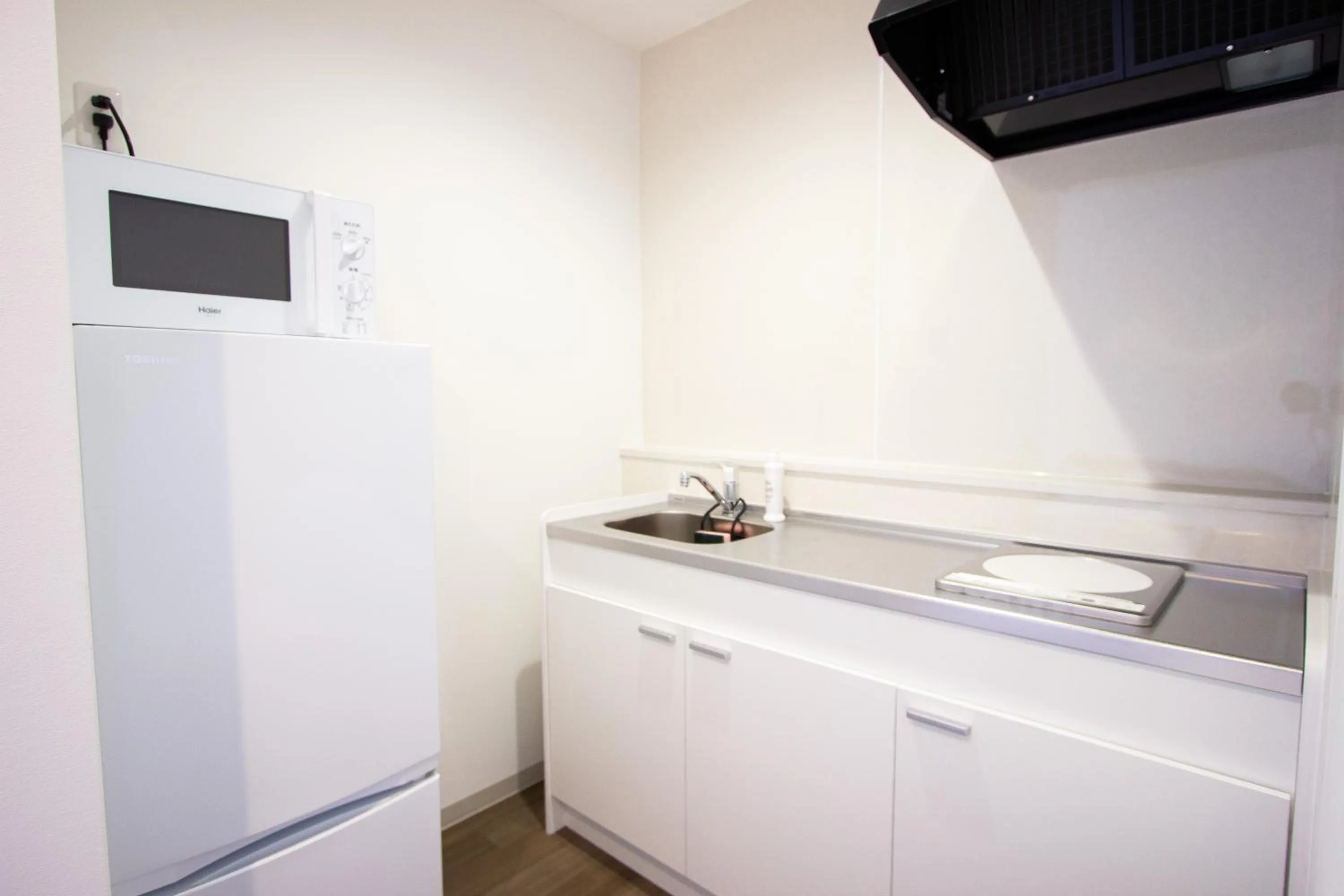kitchen in HIRO BUILDING Apartment Stay