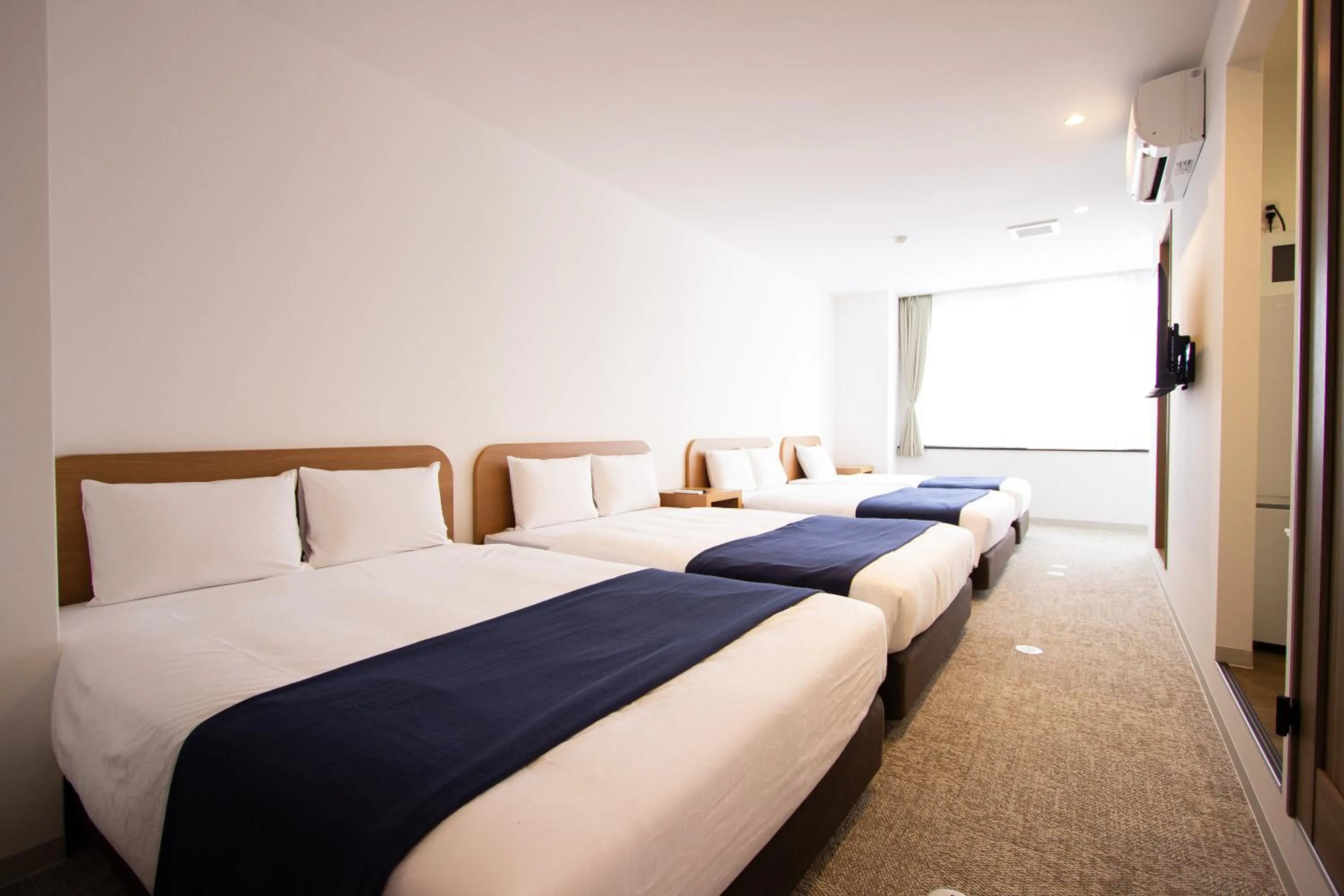 Bedroom, Bed in HIRO BUILDING Apartment Stay