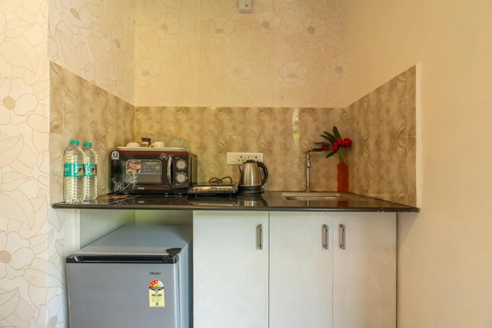 Kitchen or kitchenette in Seasons Suites - JP Nagar