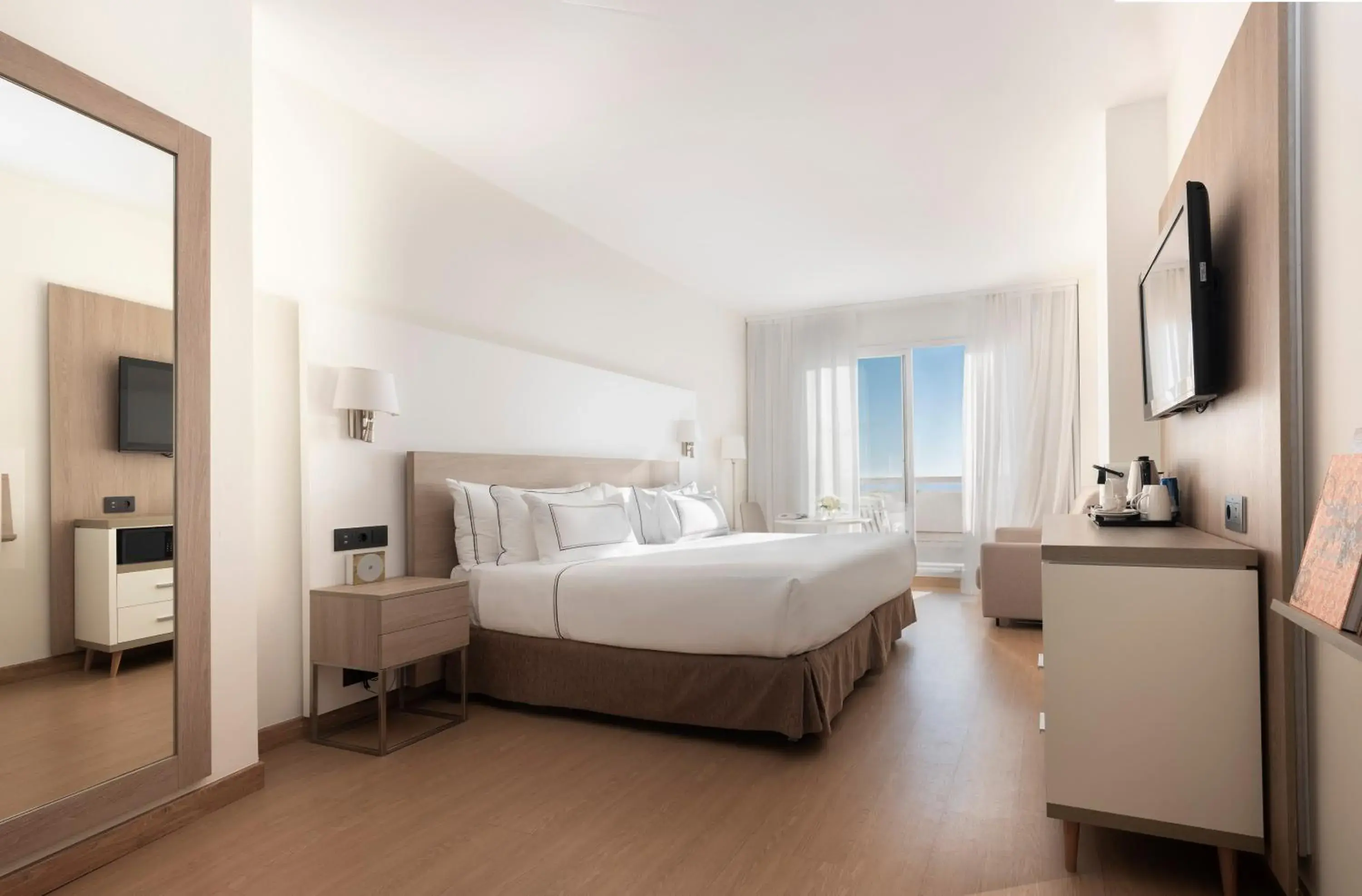 Junior Family Suite (2 Adults + 2 Children) in Melia Sitges Junior Family Suite (2 Adults + 2 Children) in Melia Sitges