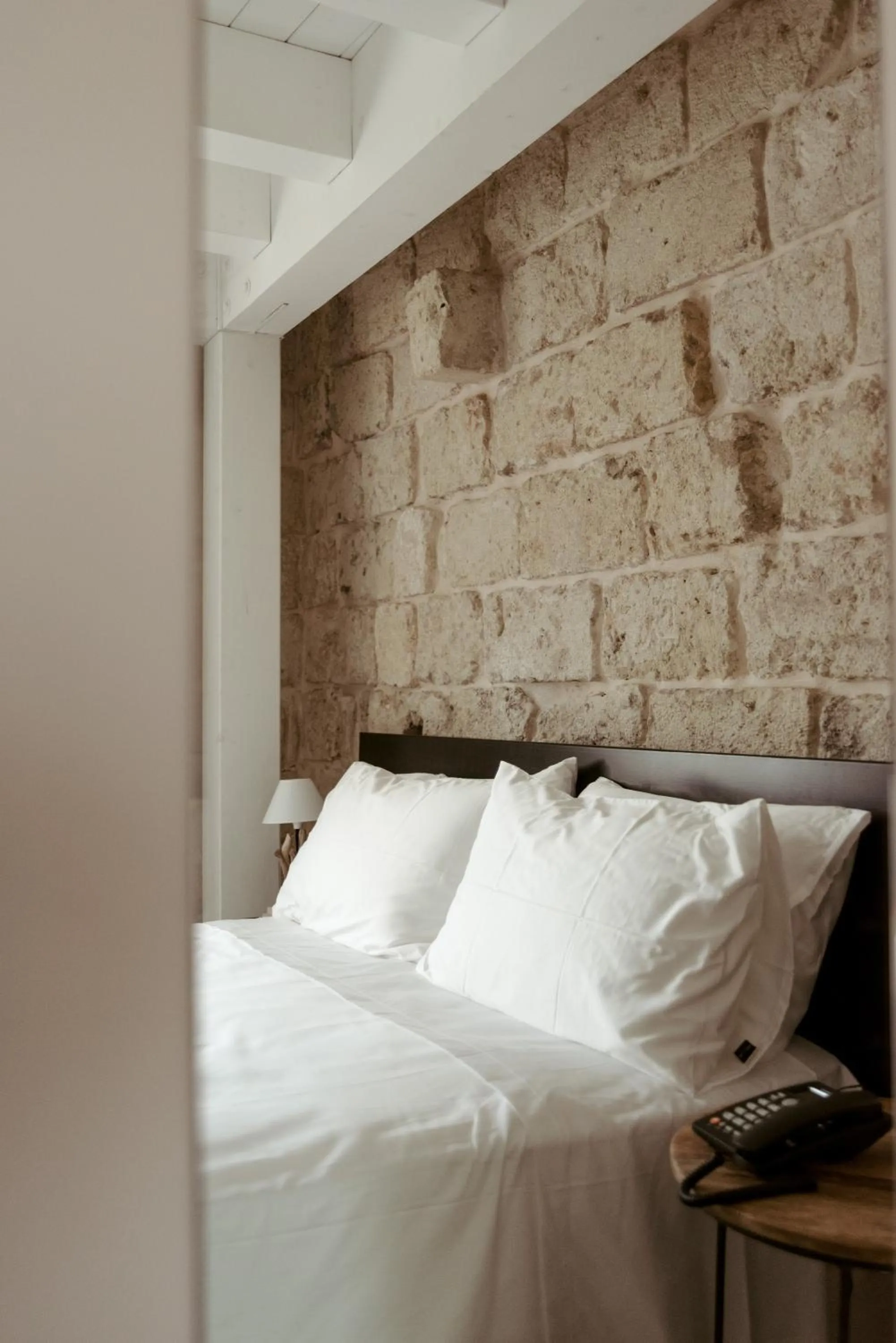 Bed in Le Carasse Boutique Hotel