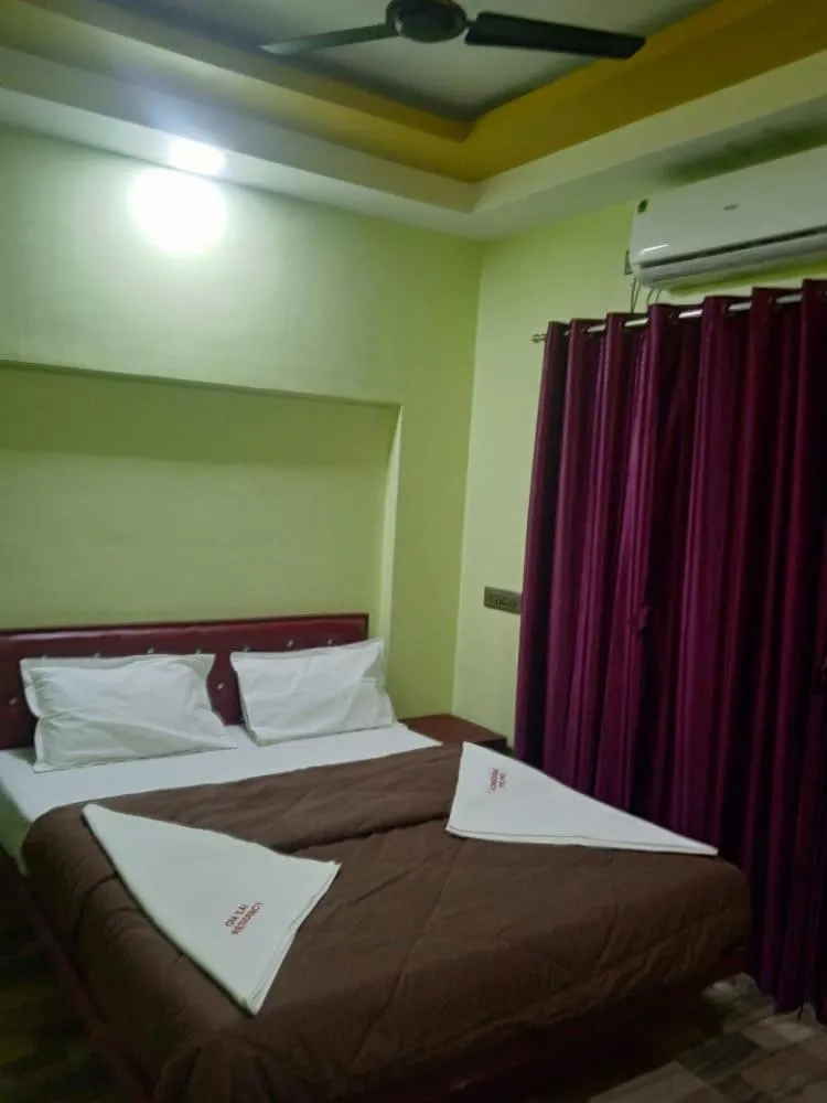 Bed in Hotel Om Sai Residency By WB Inn