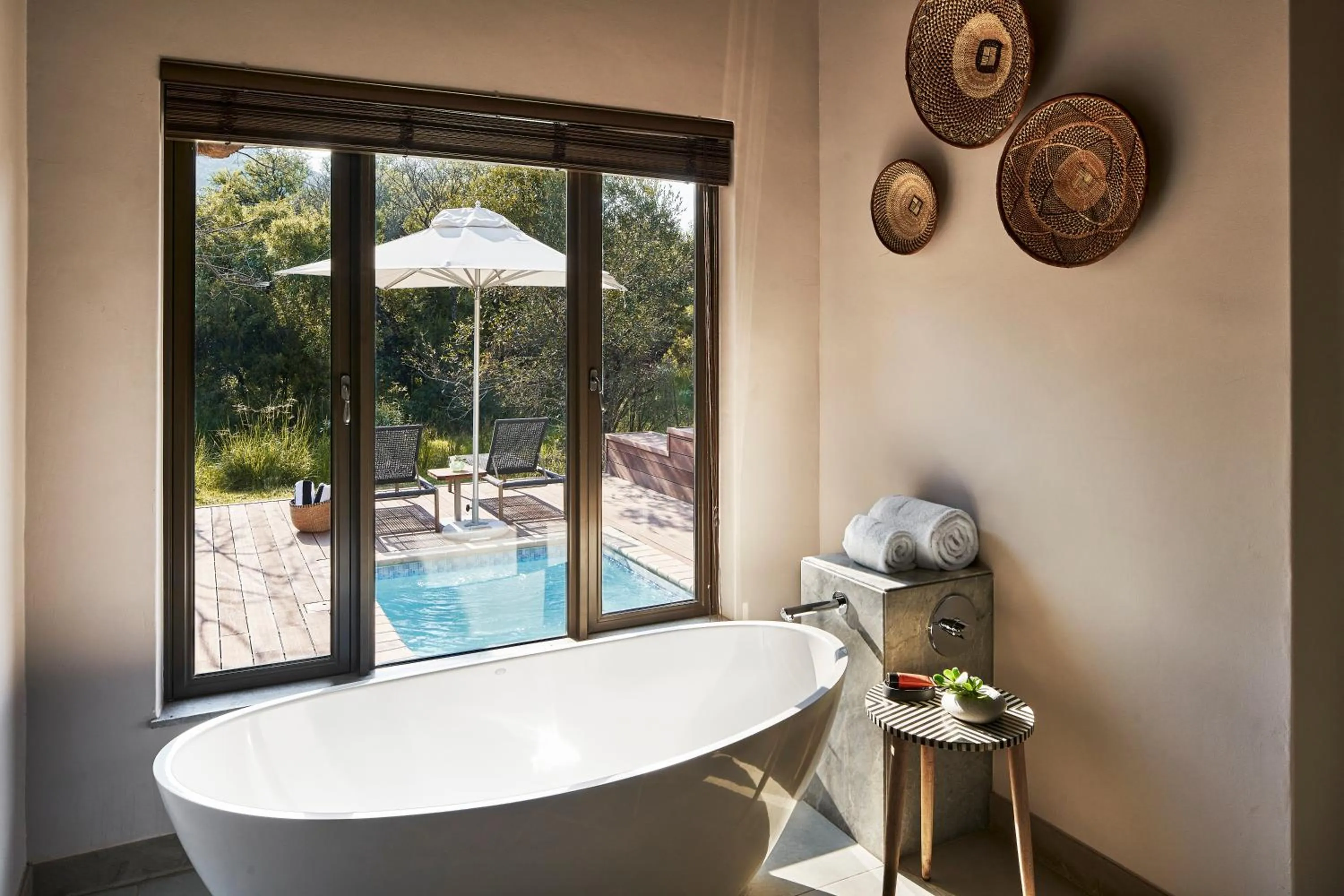 Bathroom in Letamo at Qwabi Private Game Reserve by NEWMARK