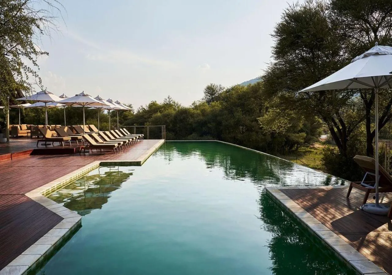 Swimming pool in Letamo at Qwabi Private Game Reserve by NEWMARK
