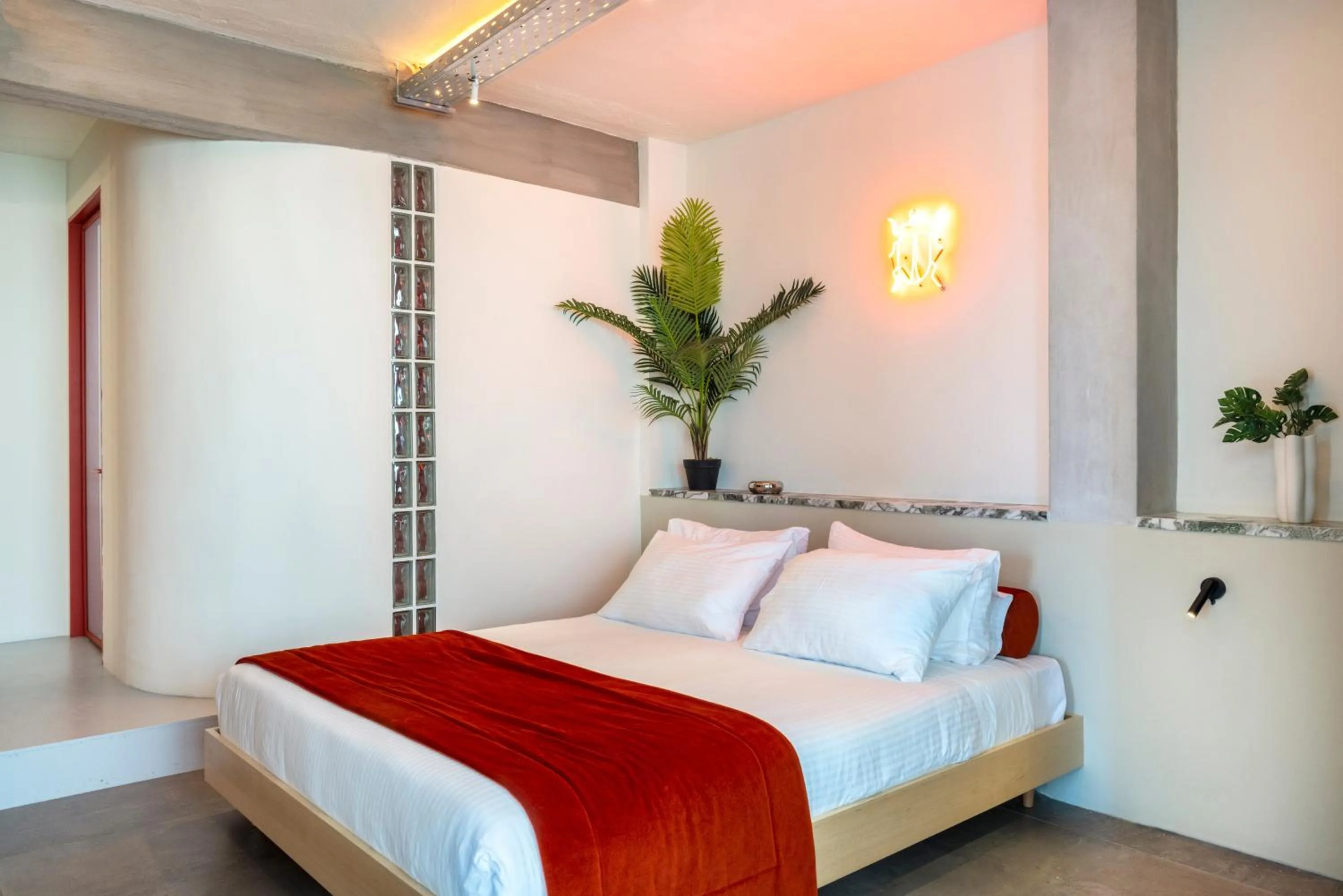 Bed in The Newel Metaxourgeio by Athens Stay