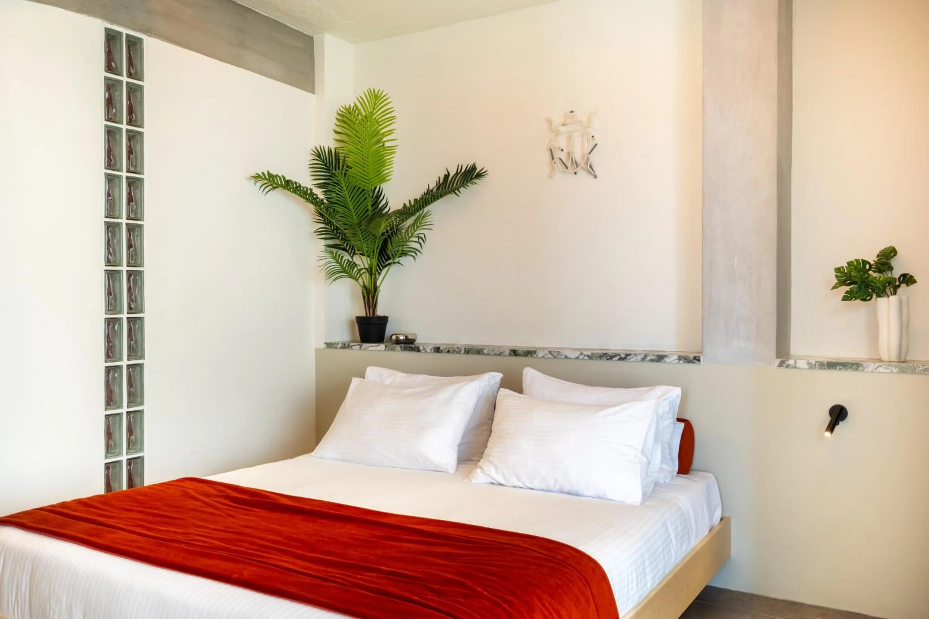 Bed in The Newel Metaxourgeio by Athens Stay