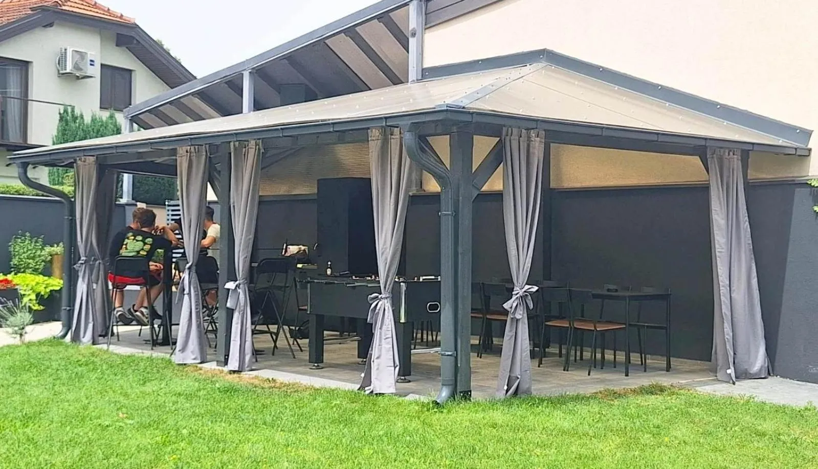 Seating area in Arcobaleno Apartments & Rooms