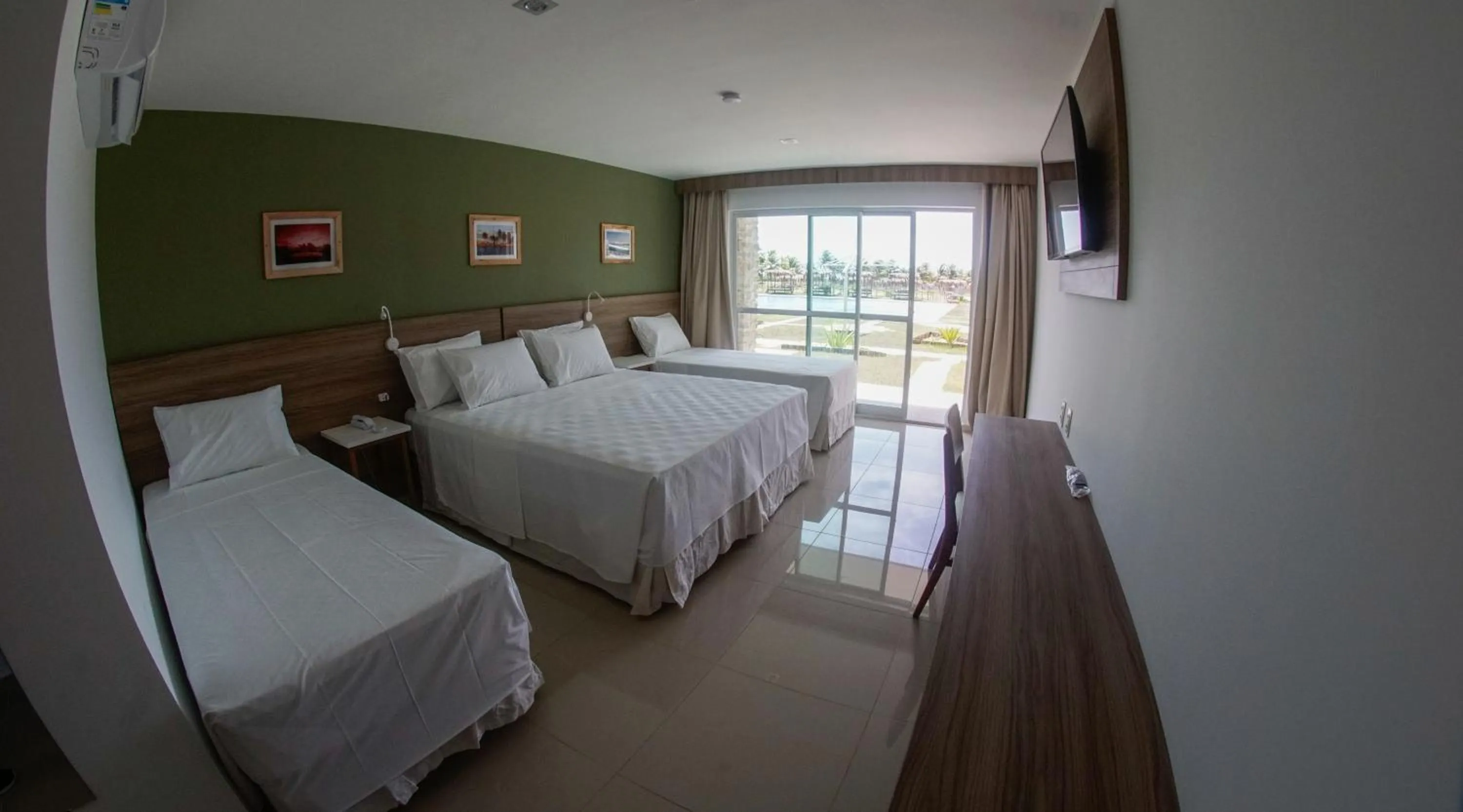 Bed in Eco Privillege Hotel