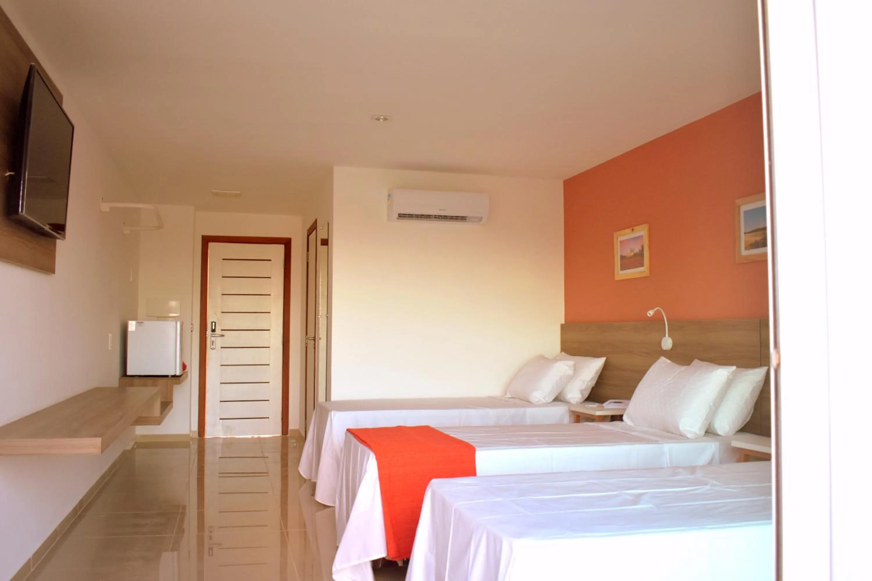 Bed in Eco Privillege Hotel