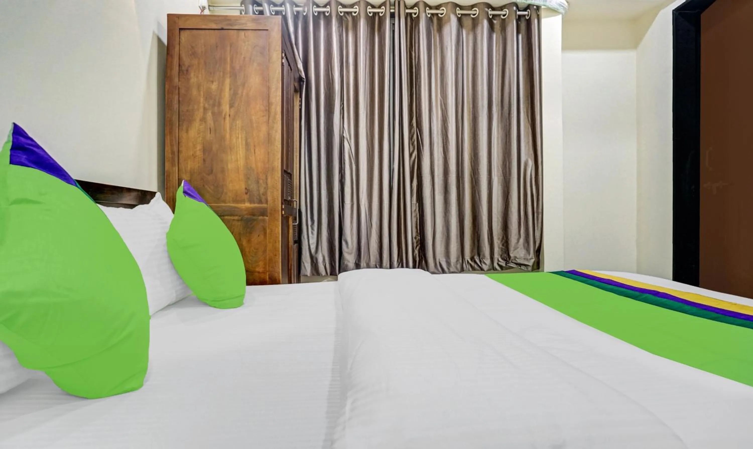 Bedroom, Bed in Treebo Tulip