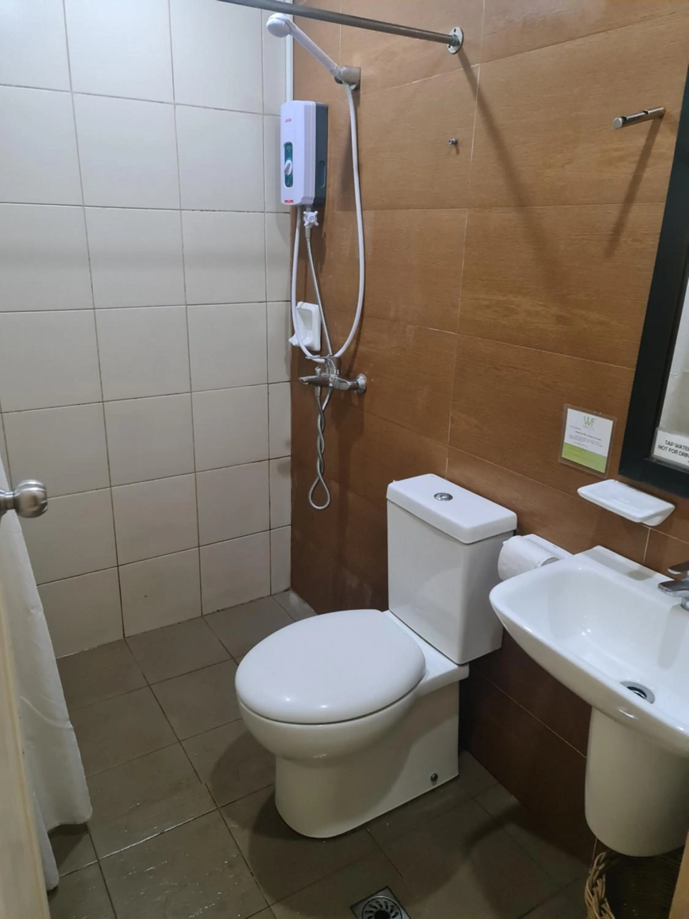 Toilet in Coron town travellers inn