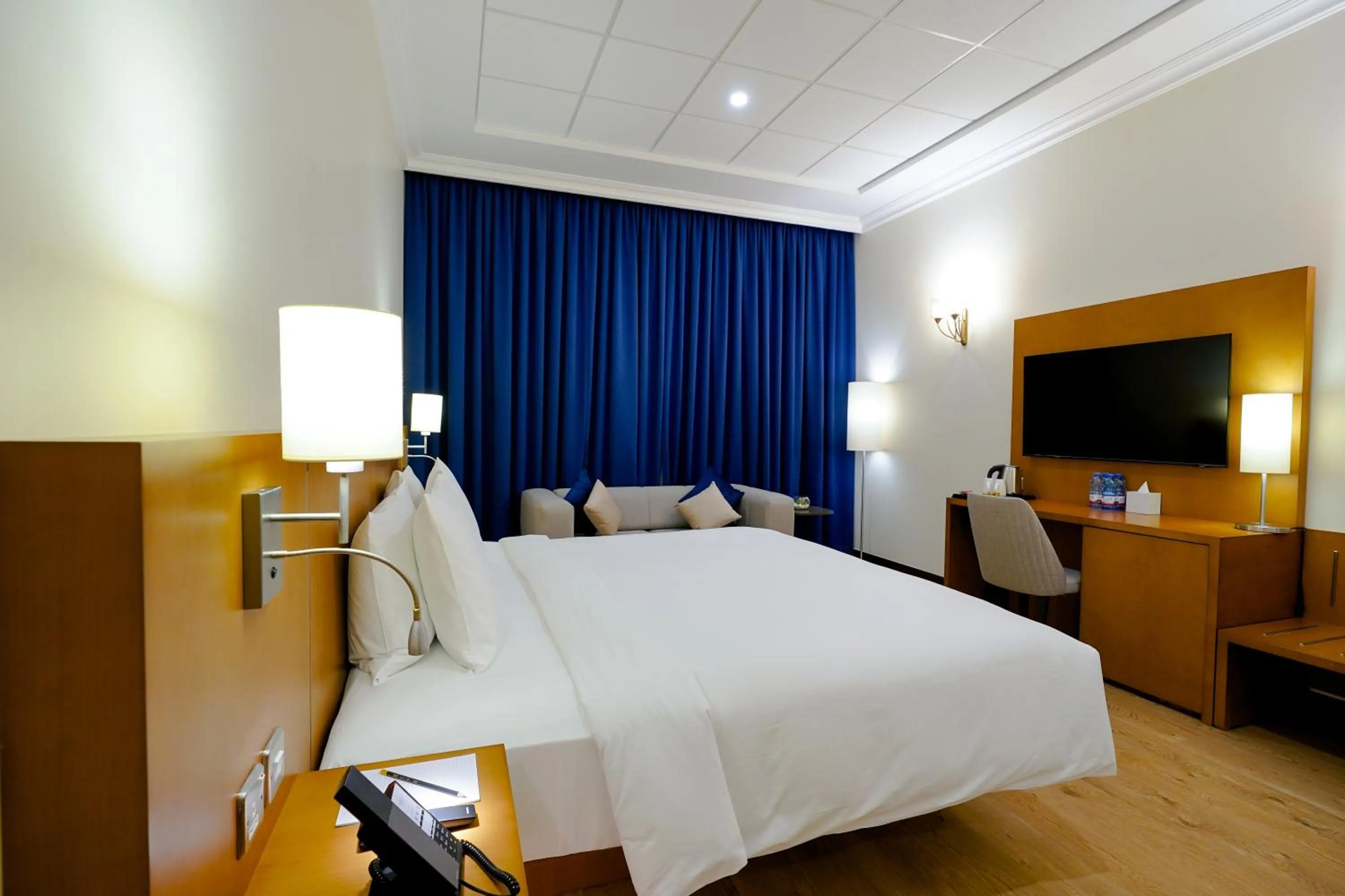 Bed in La Maison Hotel Doha