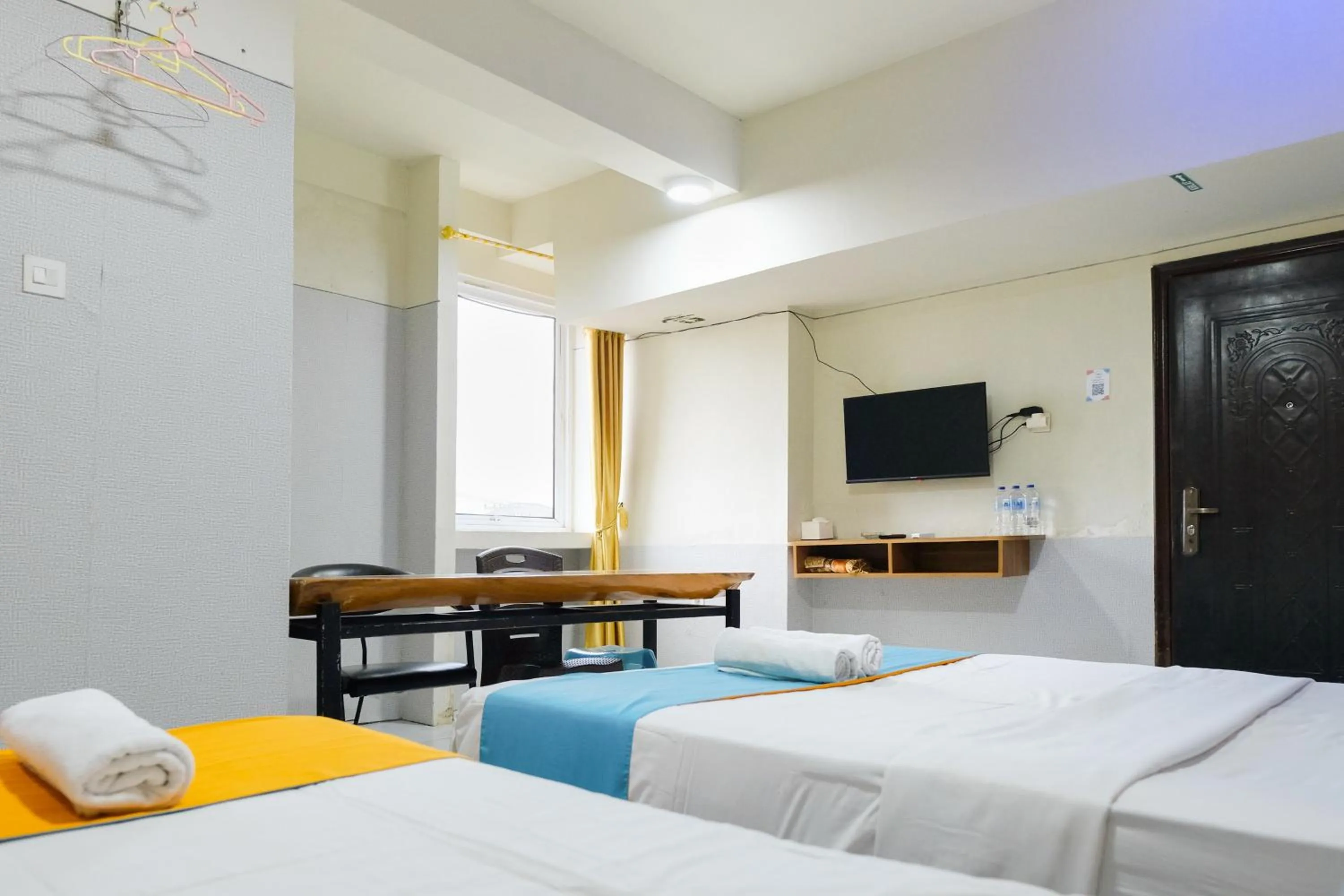 Bedroom, Bed in Sans Hotel Havila Bengkulu