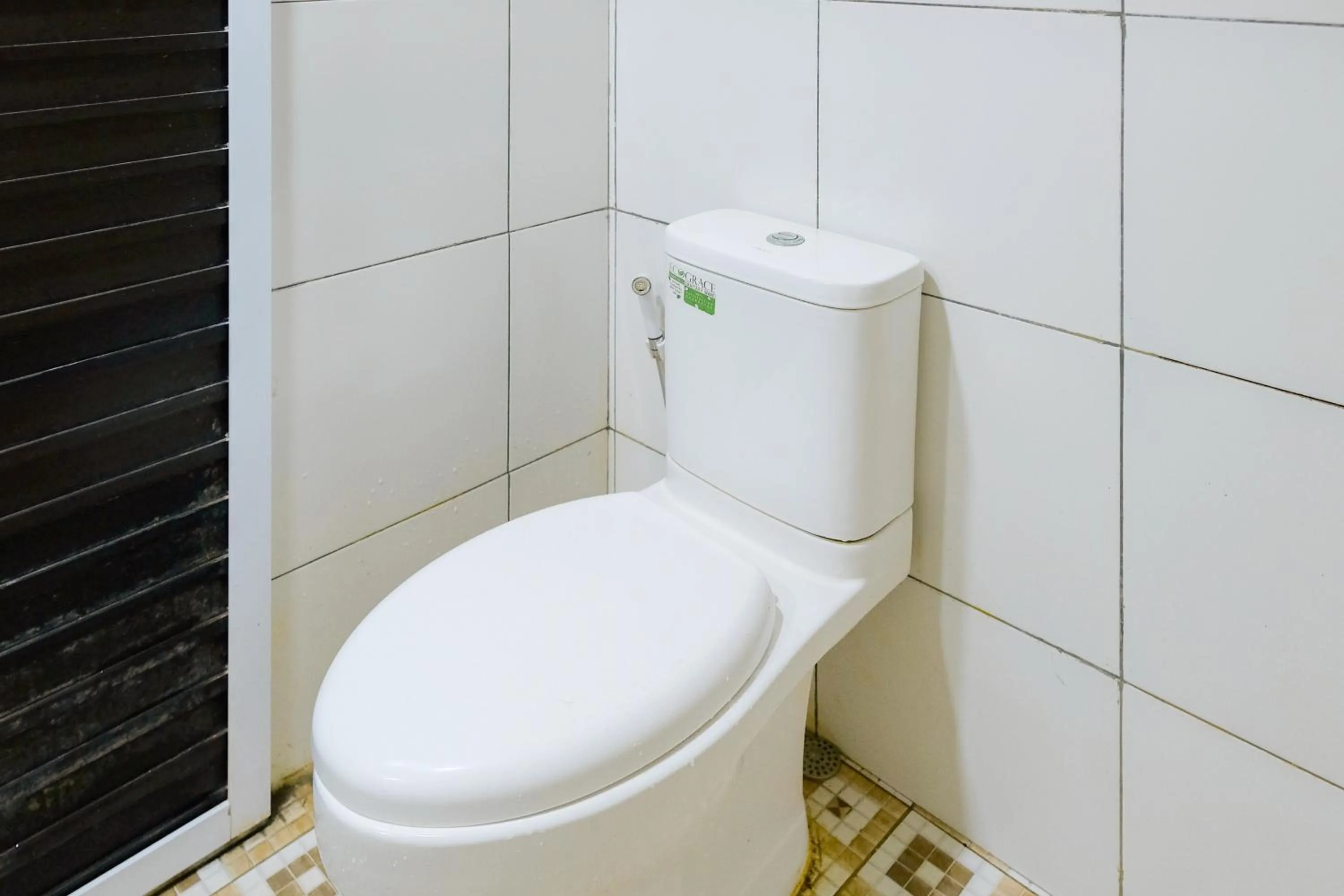 Bathroom in Sans Hotel Havila Bengkulu